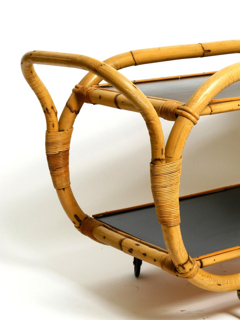 Mid Century bar and serving trolley made of bamboo with formica
