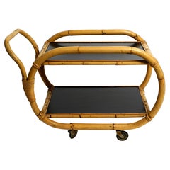 Mid Century bar and serving trolley made of bamboo with formica surfaces