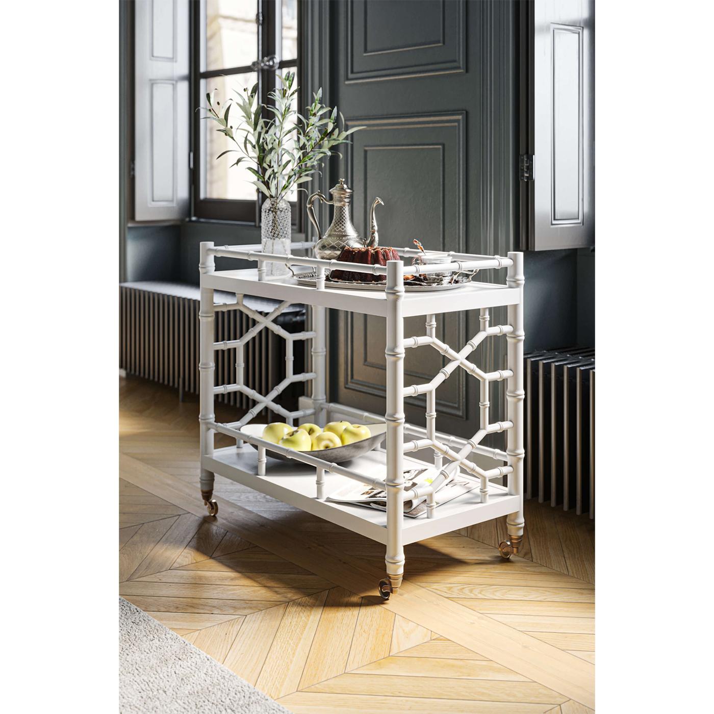Crafted with meticulous attention to detail, this bar cart combines functionality with a sleek, timeless design. The crisp white finish and bamboo-inspired frame exude a chic vibe that effortlessly complements any decor.

Inspired by English