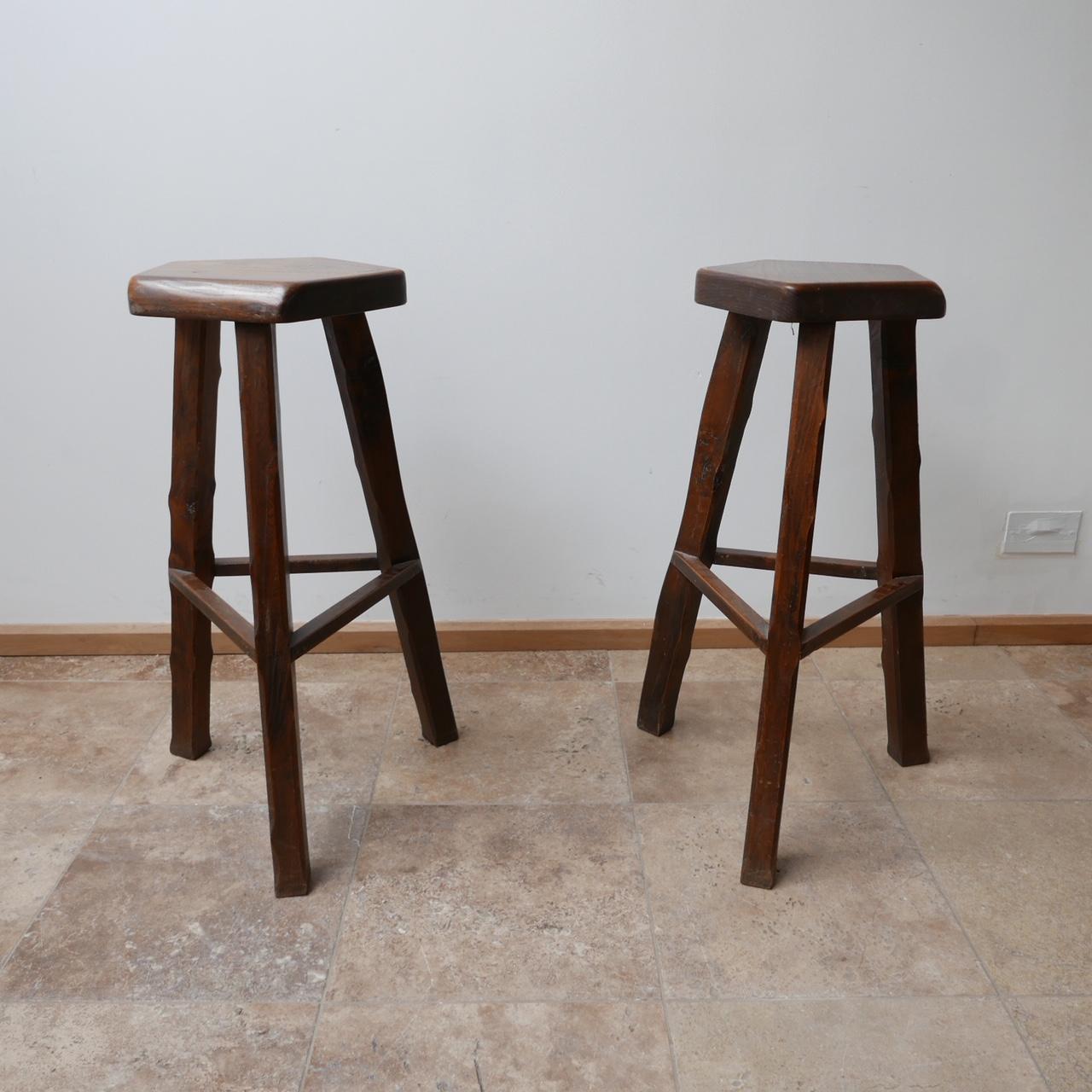 Mid-century bar stools attributed to Olavi Hänninen. 

Finland, c1960s. 

Organic forms, in stained wood likely solid elm. 

Two available. Price per piece. 

Priced and sold individually.

Dimensions: 47 W x 47 D x 80 height x 33 diameter