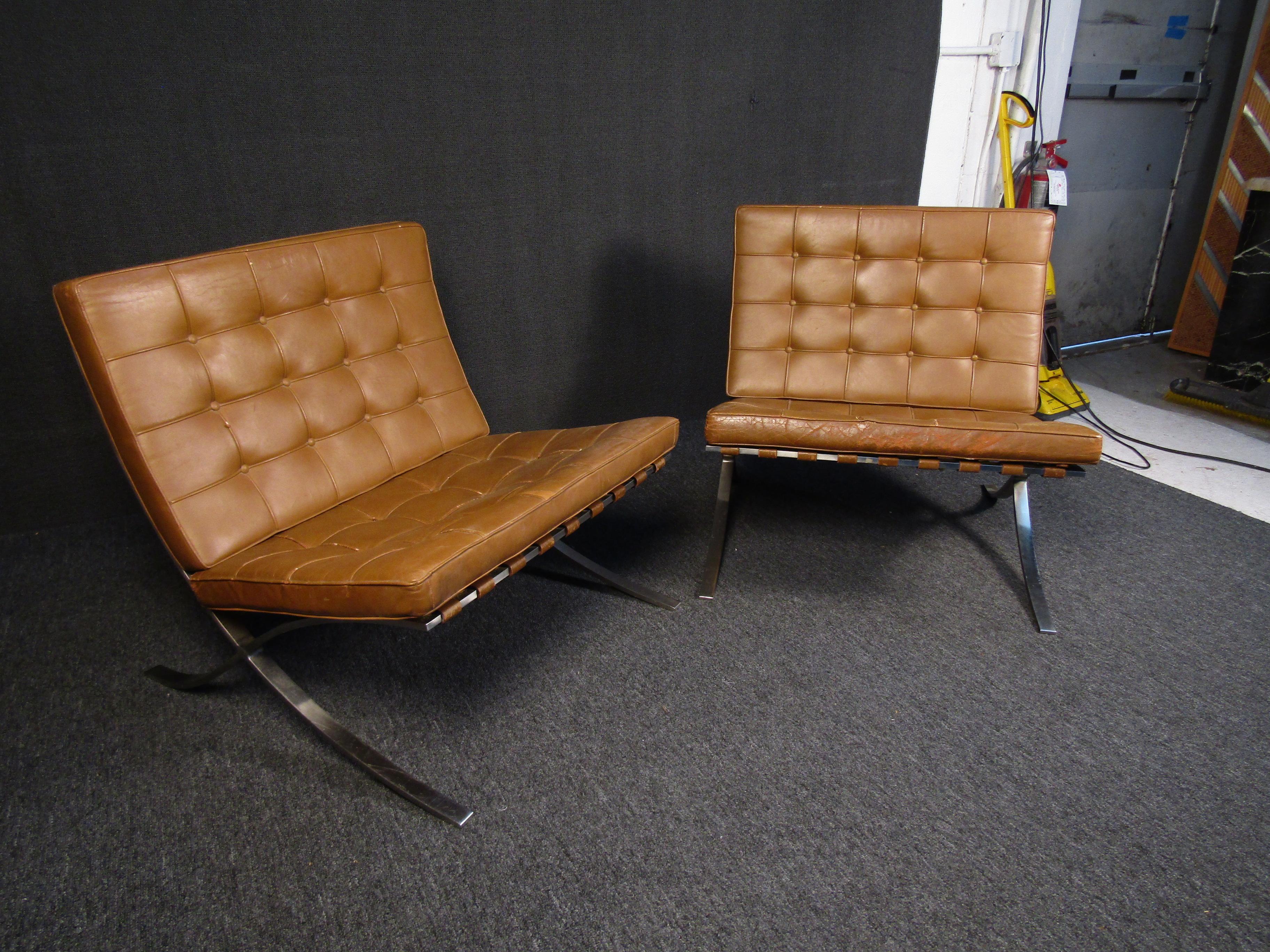 This set of original tan lounge chairs are well made and in fair condition. With vinyl seating and chrome plated steel frame construction, these have been well cared for and would make an excellent addition to your collection.