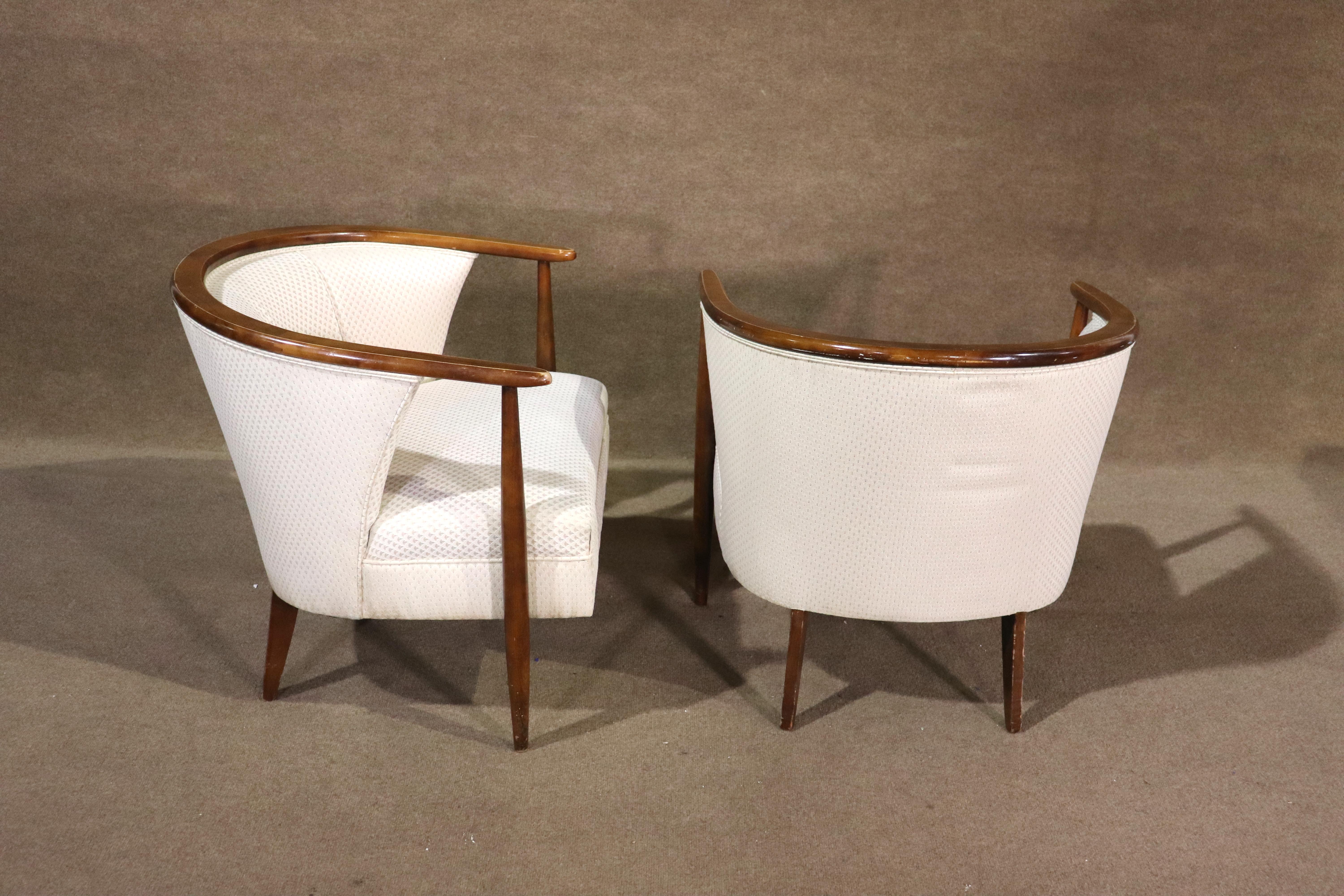 Pair of rounded back lounge chairs with wood trimmed backs. Great Mid-Century Modern design with comfort for home or office.
Please confirm location NY or NJ.