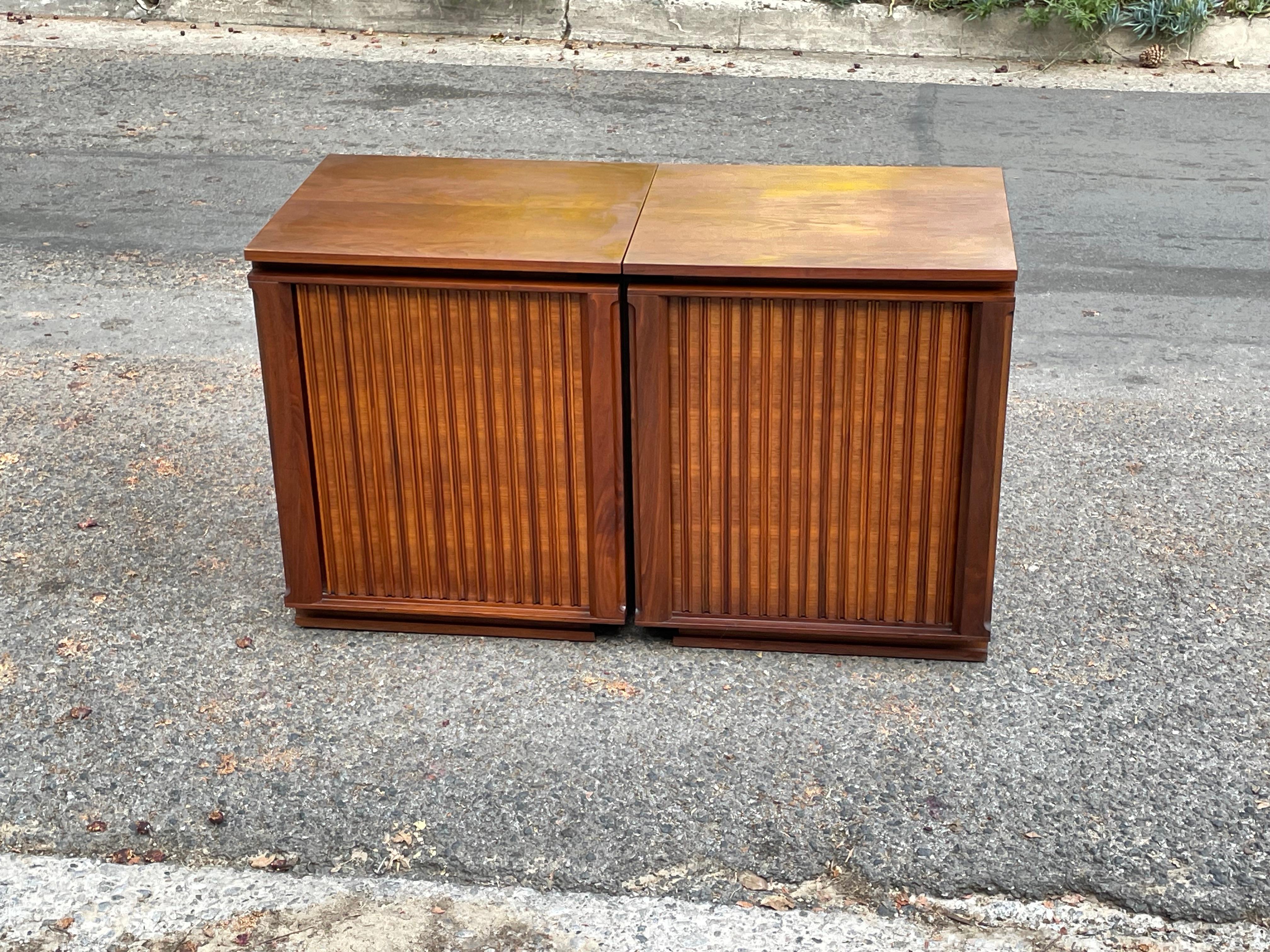 Gorgeous Mid-Century Modern Tambour Door Credenza Cabinet by Barzilay. Can also be used separately as end tables, circa 1960s

It was originally two speaker cabinets. Inside is totally open so it's perfect for storage.

Rare piece. The two
