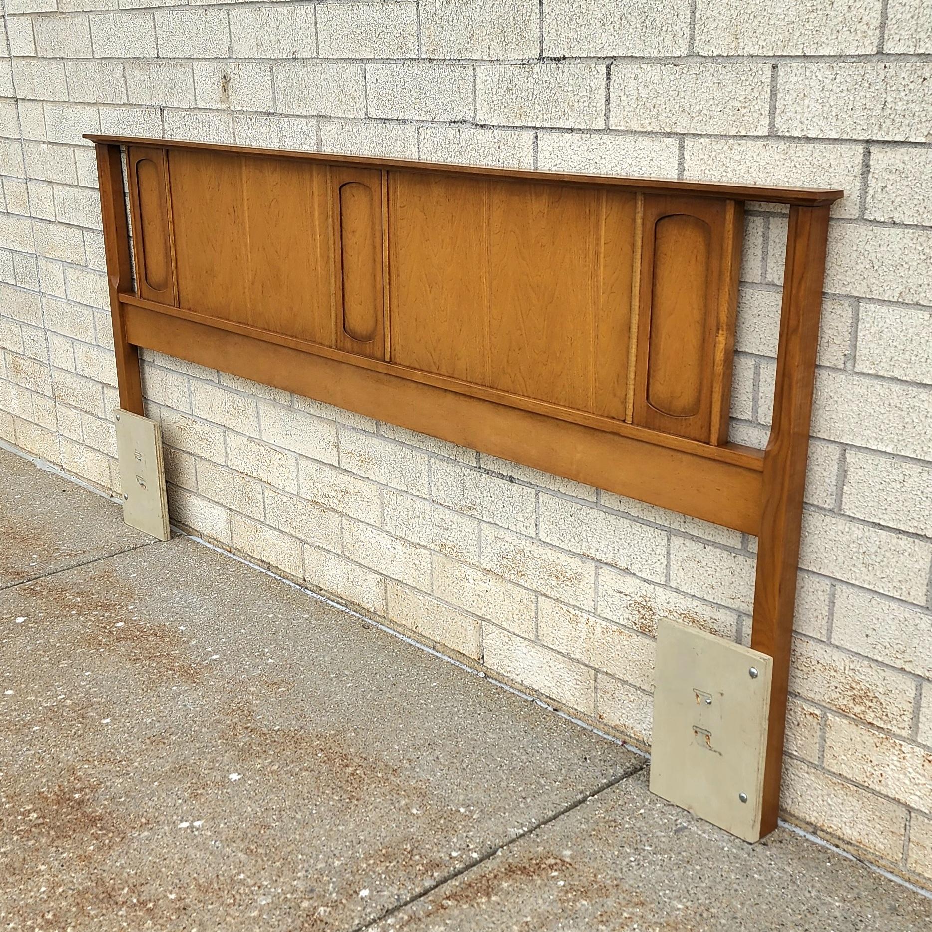 This is a beautiful Mid-Century Headboard by Bassett Furniture made out of solid wood. Made in a 