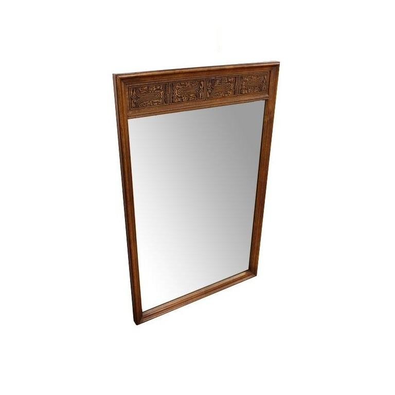 1960s Bassett Mid-Century Modern Mayan walnut wood mirror. Top edge is embellished with ornately carved motif derived from Mayan culture.

Matching dresser reference number: LU4528214674372 available (sold separately).