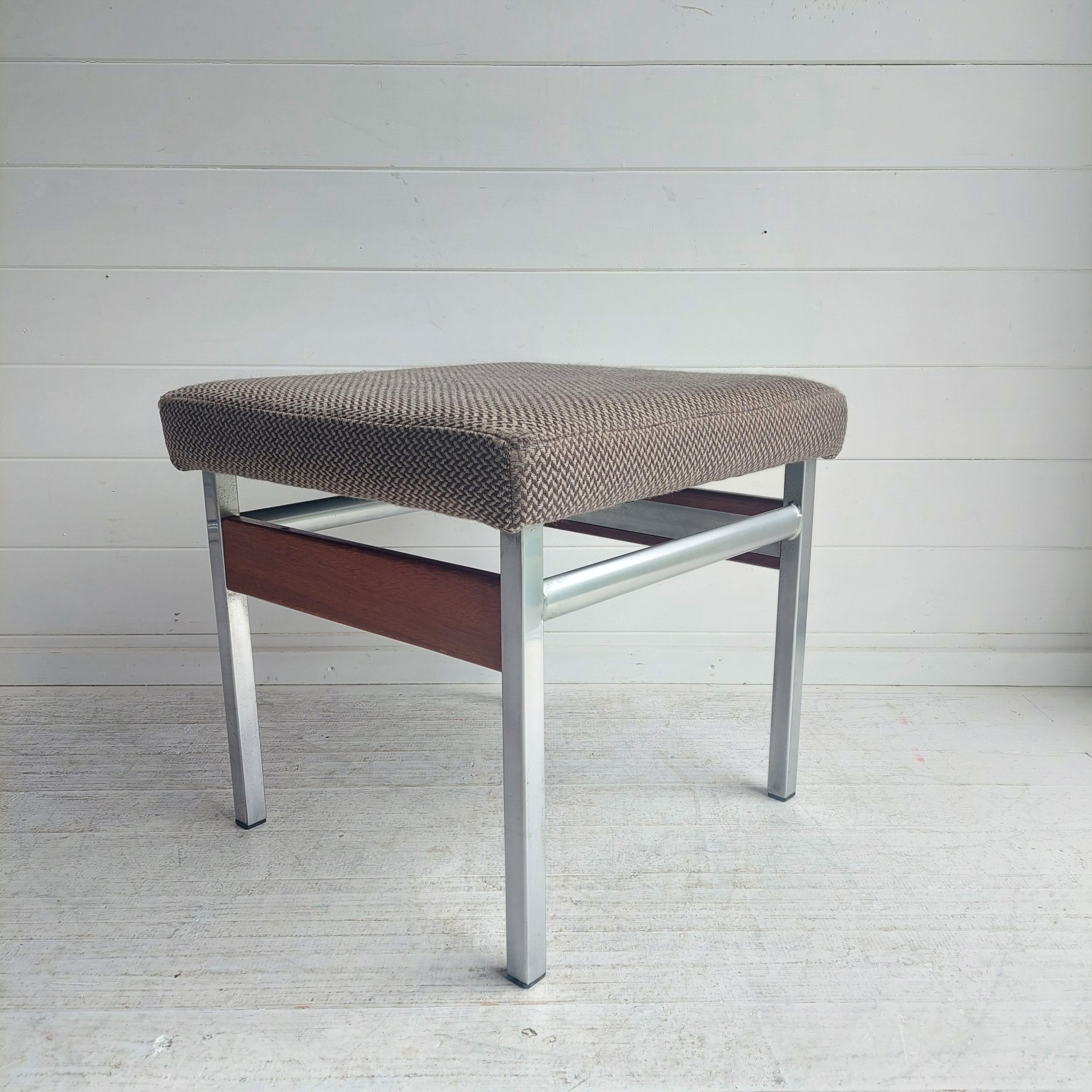 Mid Century Vintage footrest ottoman is made in typical mid-century style. 
The stool was made most probably in the 1960/70s.
Designed in the manner of Sven Ivar Dysthe for  Dokka Mobler, Norway.

The frame is manufactured from a combination of