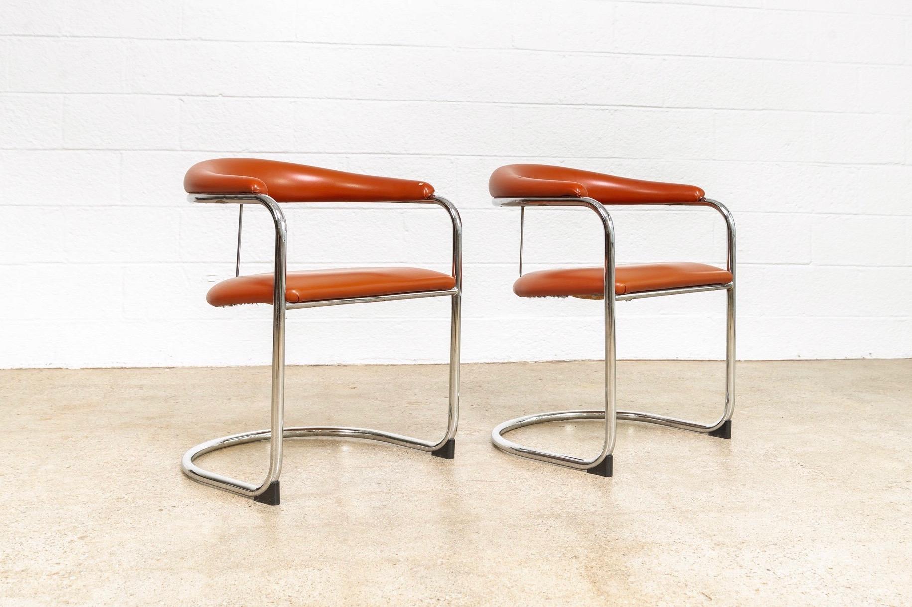 These vintage midcentury model SS33 armchairs circa 1970 were designed by Hungarian designer Anton Lorenz for Thonet in 1929. The Classic Bauhaus design features a sleek, sculptural profile with clean, geometric lines and gentle curves. The seats