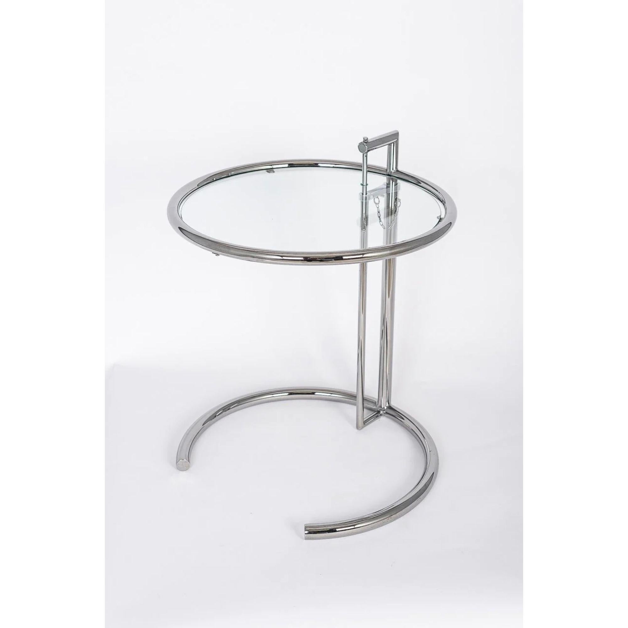Midcentury Bauhaus E1027 steel and glass side table by Eileen Gray.

This vintage tubular steel and glass E1027 end table was designed by Eileen Gray in 1926. The ingenious design features a chrome-plated tubular steel frame with circular glass
