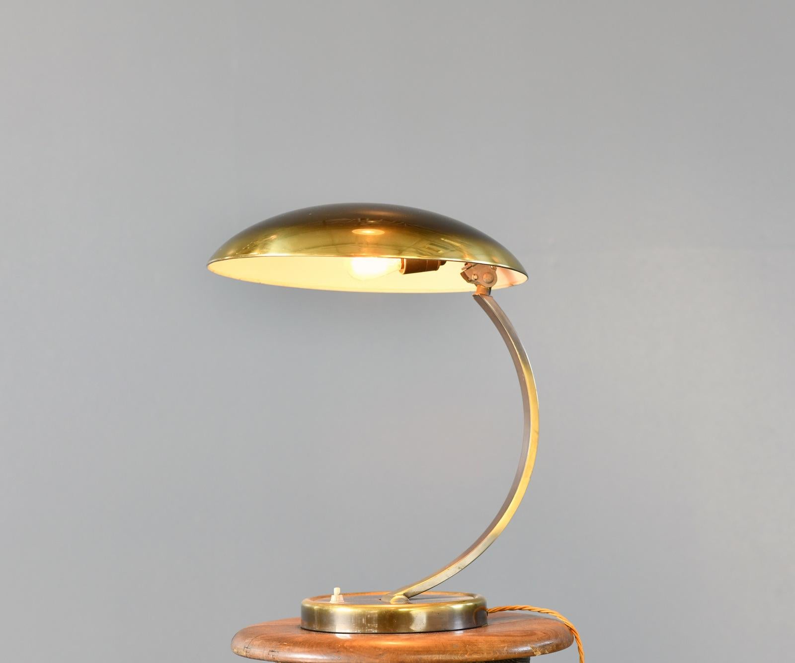 Mid Century Bauhaus Lamp By Kaiser Idell Model 6751 Circa 1950s

- Brass arm and shade
- On/Off switch on the base
- Adjustable arm and shade
- Takes E27 fitting bulbs
- German ~ 1950s
- 40cm tall x 35cm wide x 37cm deep

Christian Dell

Dell was