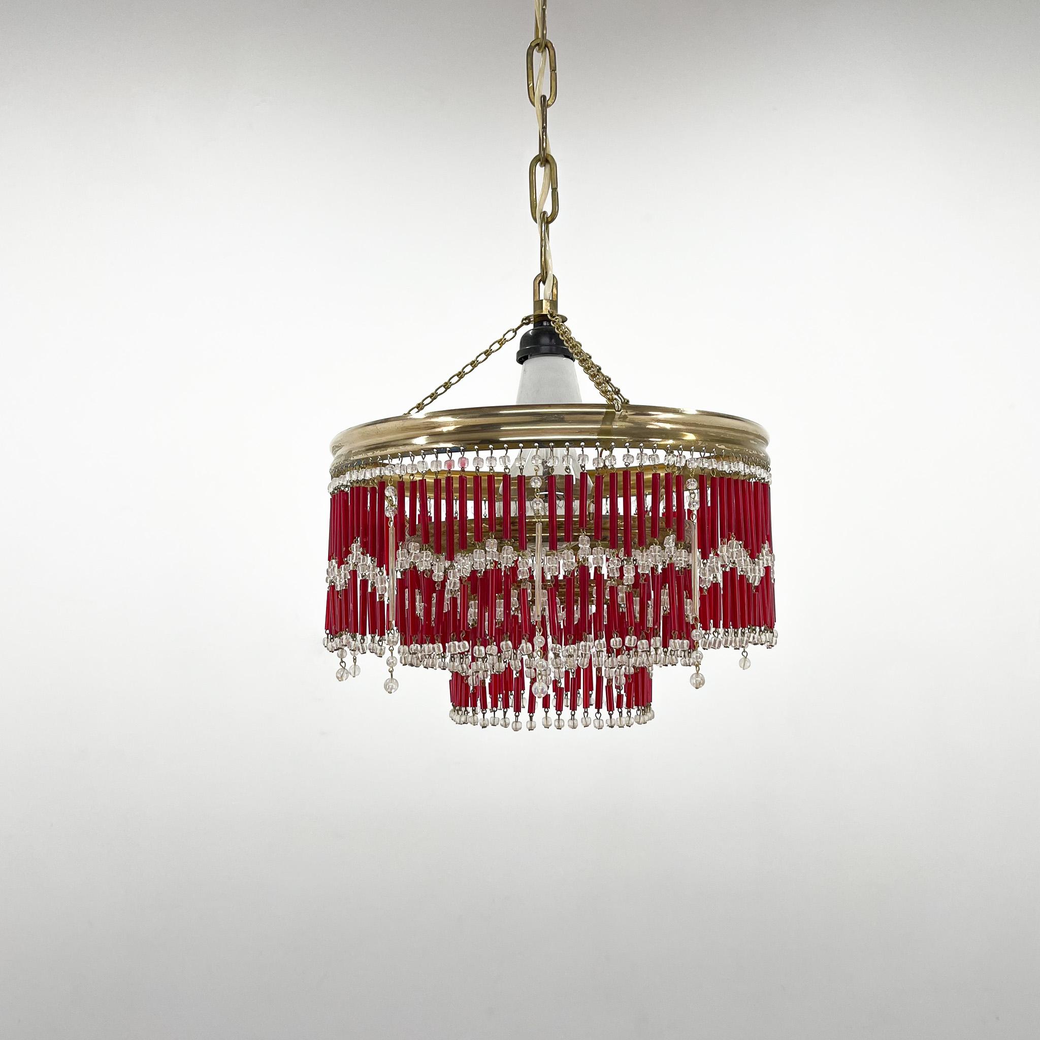 Hanging beaded chandelier from Jablonec Glassworks. Combination of glass and brass.Bulb: 1x E25-27.