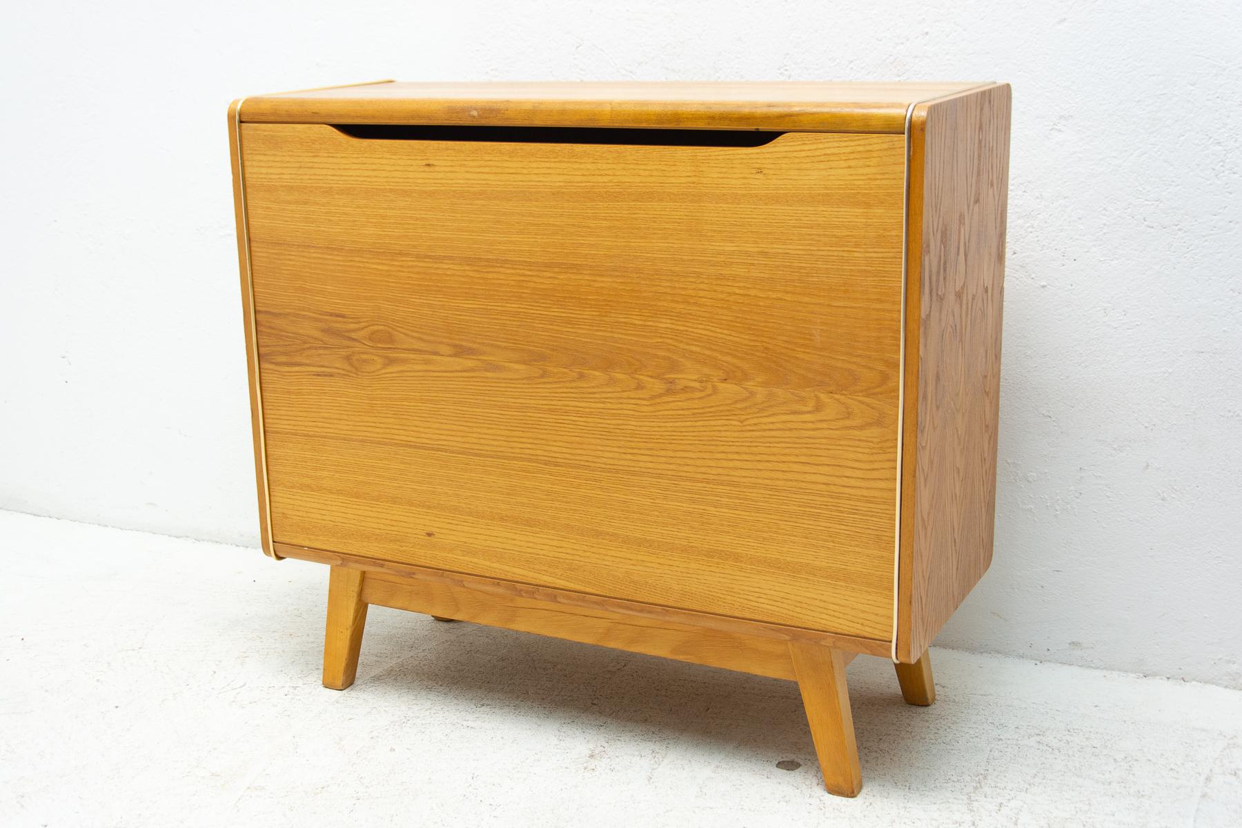 Mid-Century Modern dresser by Bohumil Landsman for Jitona. Made in the former Czechoslovakia during the 1960s. The dresser is a part of living set. The furniture is primarily intended as a dresser, but it can also be used as a TV cabinet and the