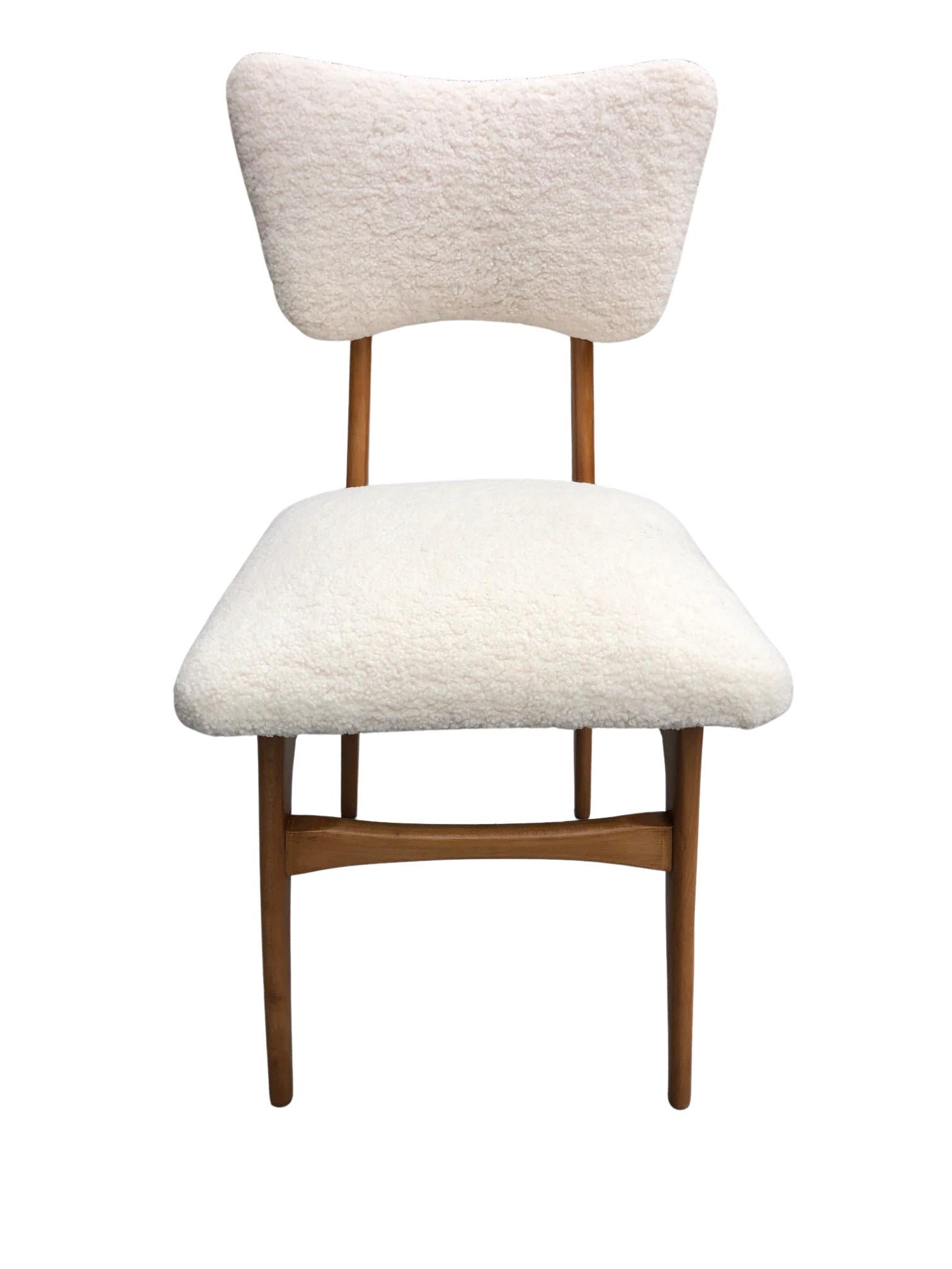 Unique chair manufactured in Poland in the 1960s, designed by Rajmund Halas. 

The upholstery is made of pleasant to touch boucle textile. It is high quality and durable italian fabric in a light beige color. The chair structure is made of beech