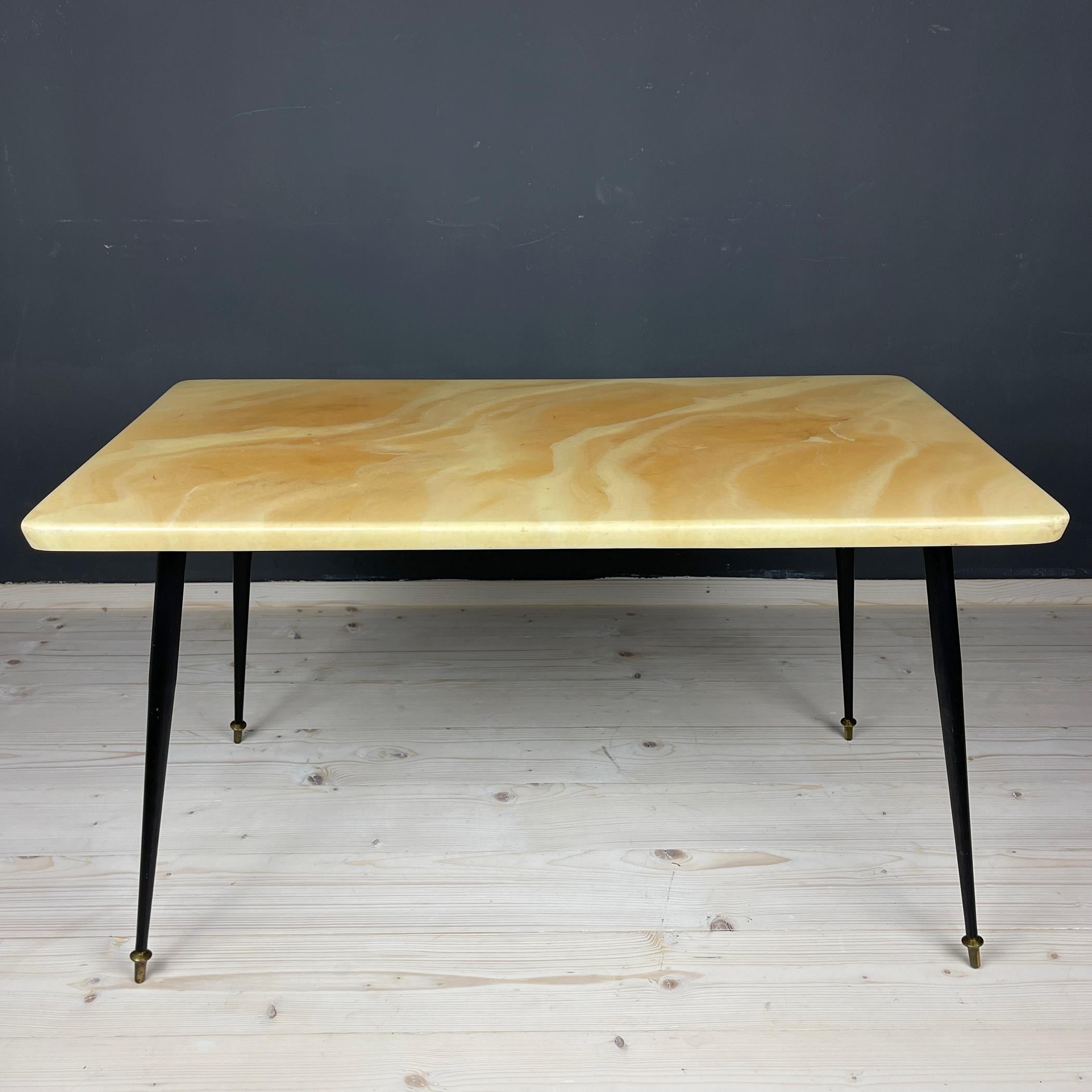 Vintage beautiful coffee table made in Italy in the 1950s. Very comfortable to use. You can place drinks, books, a phone, or a purse on it. It is also a beautiful vintage decor piece. It is as usable as it is good-looking, so it is perfect for every
