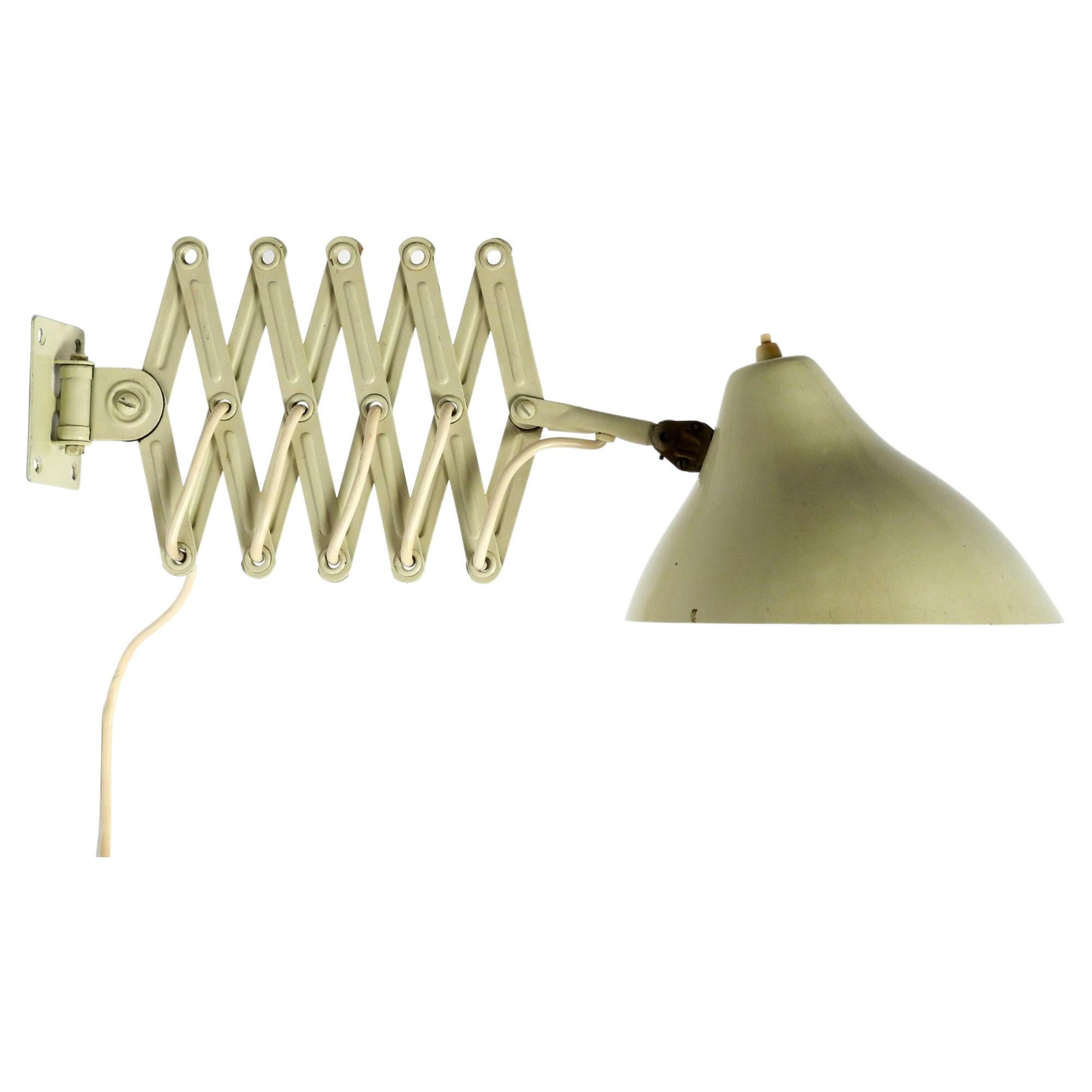Mid Century beige industrial foldable extendable wall "scissor" lamp from SIS For Sale