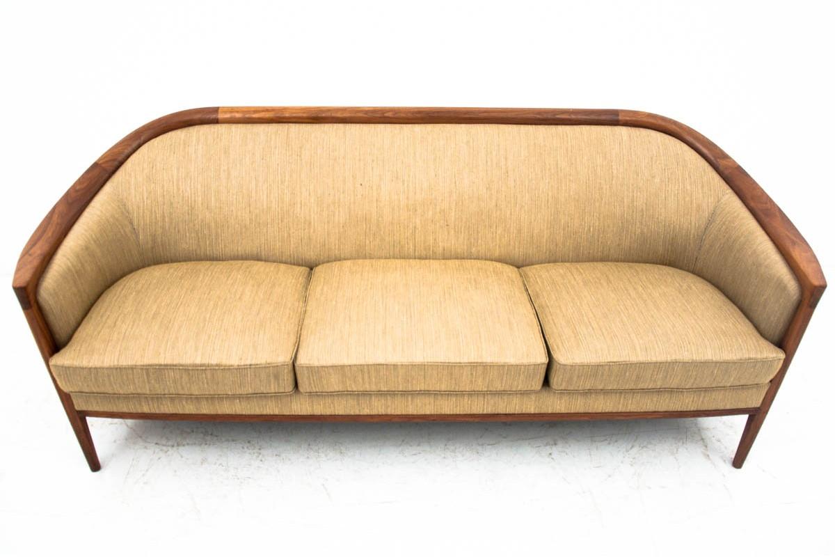 Sofa, Danish design, 1960s
Original upholstery preserved in excellent condition. 
Danish design unique walnut wood frame.