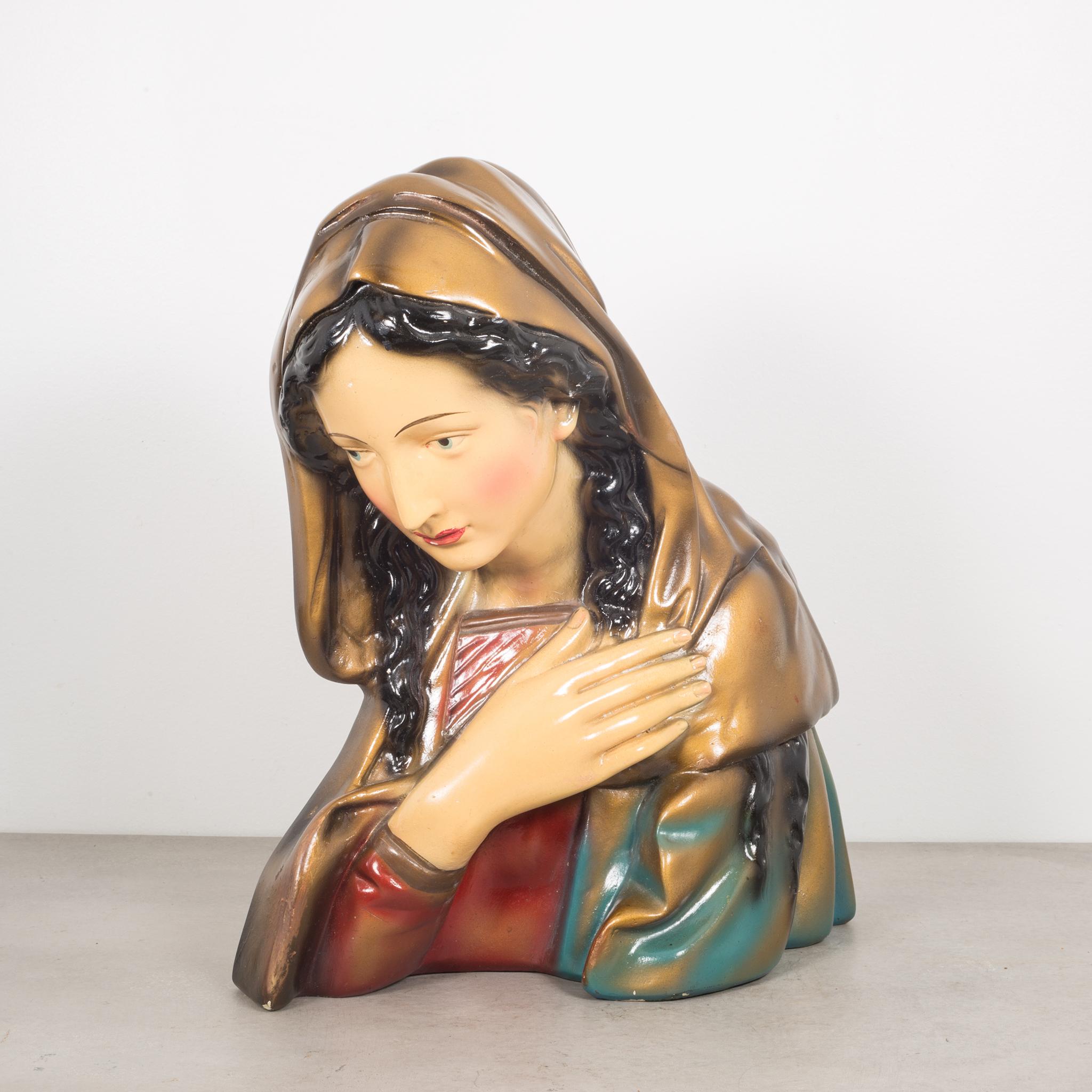 About

This is an original vintage plaster bust of the Virgin Mary made in Belgium. It is flat on one side which indicates it may have been in a church or cathedral. The piece has retained its original paint and is good condition with appropriate
