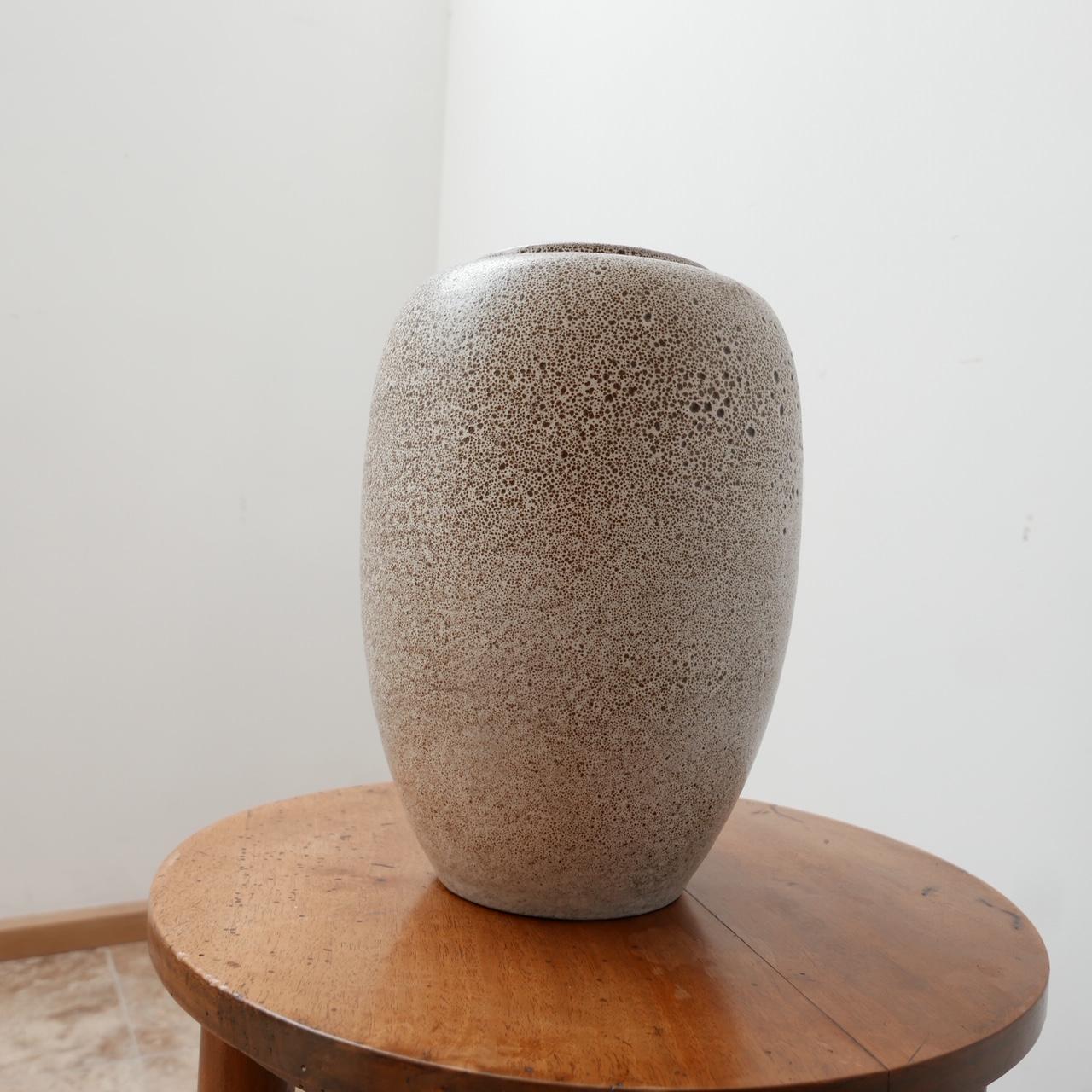 An elegant mid-century vase. 

Ceramic. 

Belgium, c1970s. 

Good condition. 

Dimensions: 31.5 height x 23 diameter in cm. The inner rim is 11 cm diameter. 

Delivery: POA.

