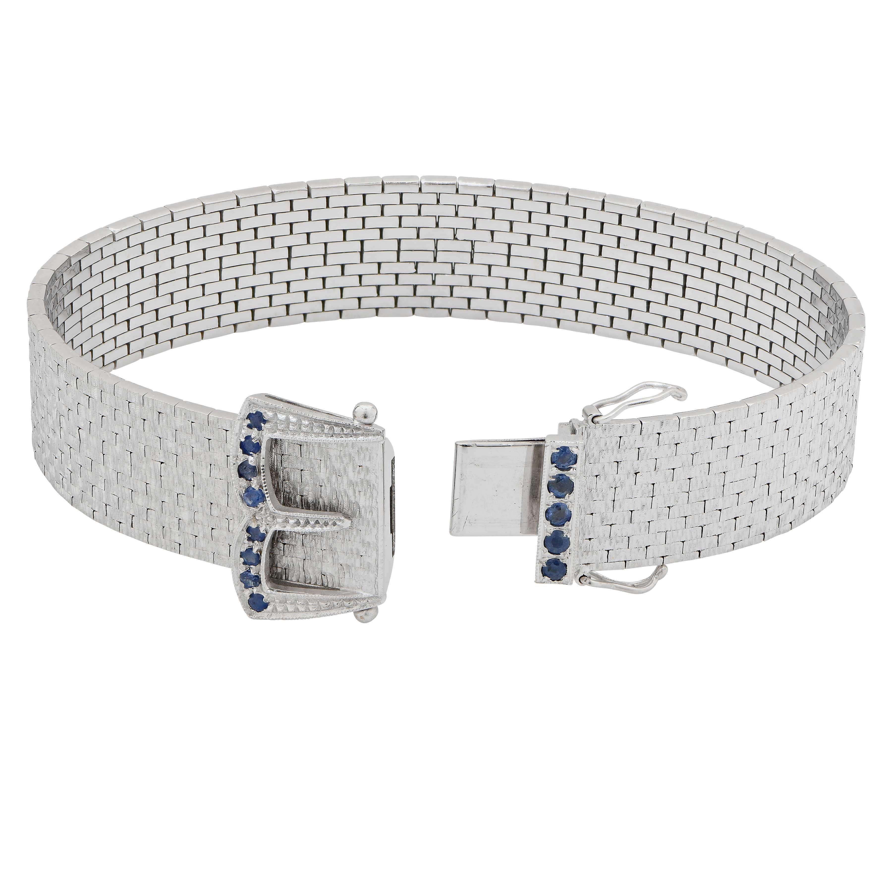 Mid Century Belt Bracelet with Sapphires in 18 Karat White Gold.
Metal 18 KT White Gold
Metal Weight 55.6 Grams
Length 7.5 inches