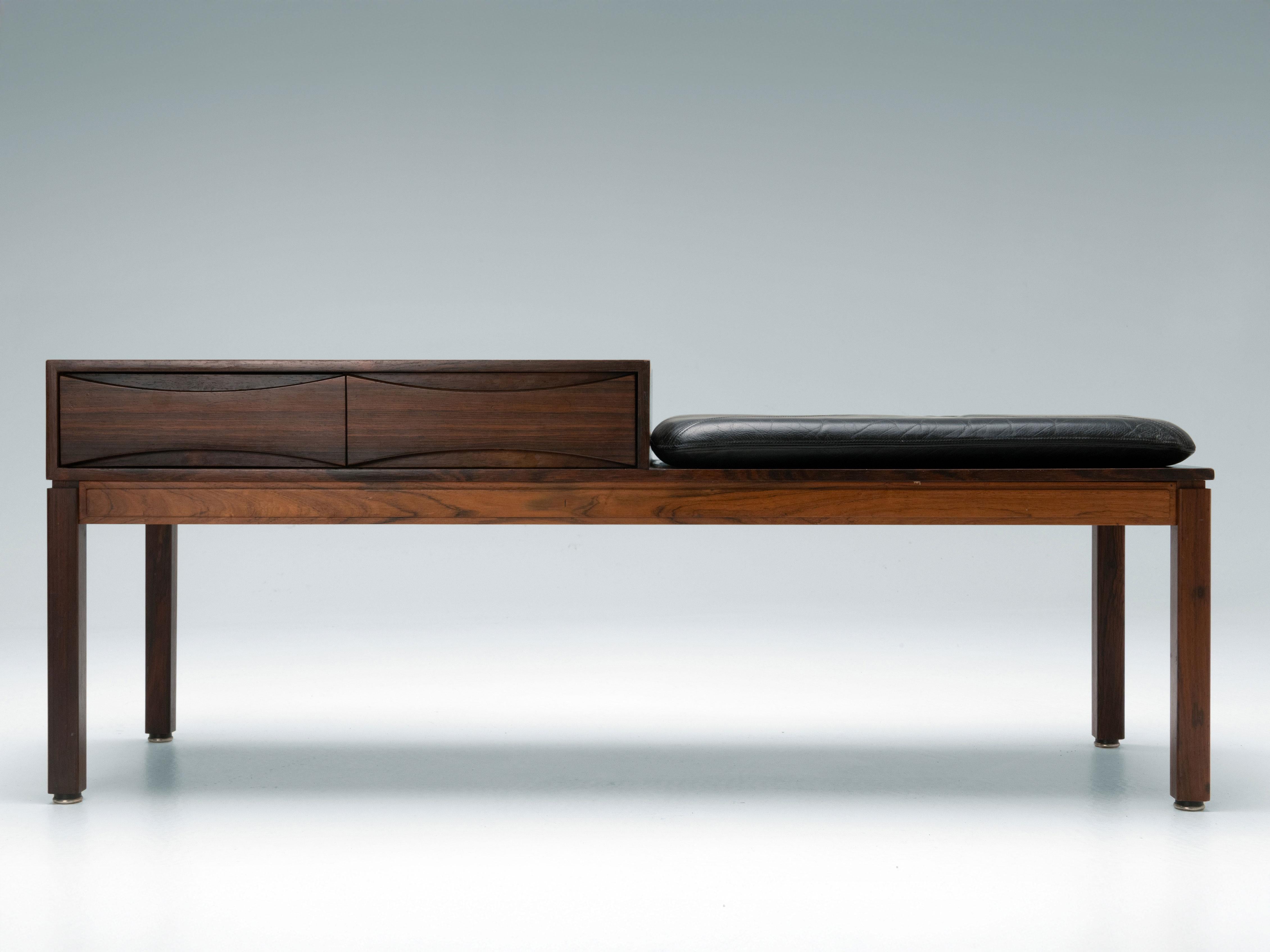Here we have a rosewood hallway set from the 1960s made by Wards Ateljéer AB. It comes together with a black leather cushion for the bench. It's possible to complete the bench with a matching mirror, which is also available! 
This bench was used in