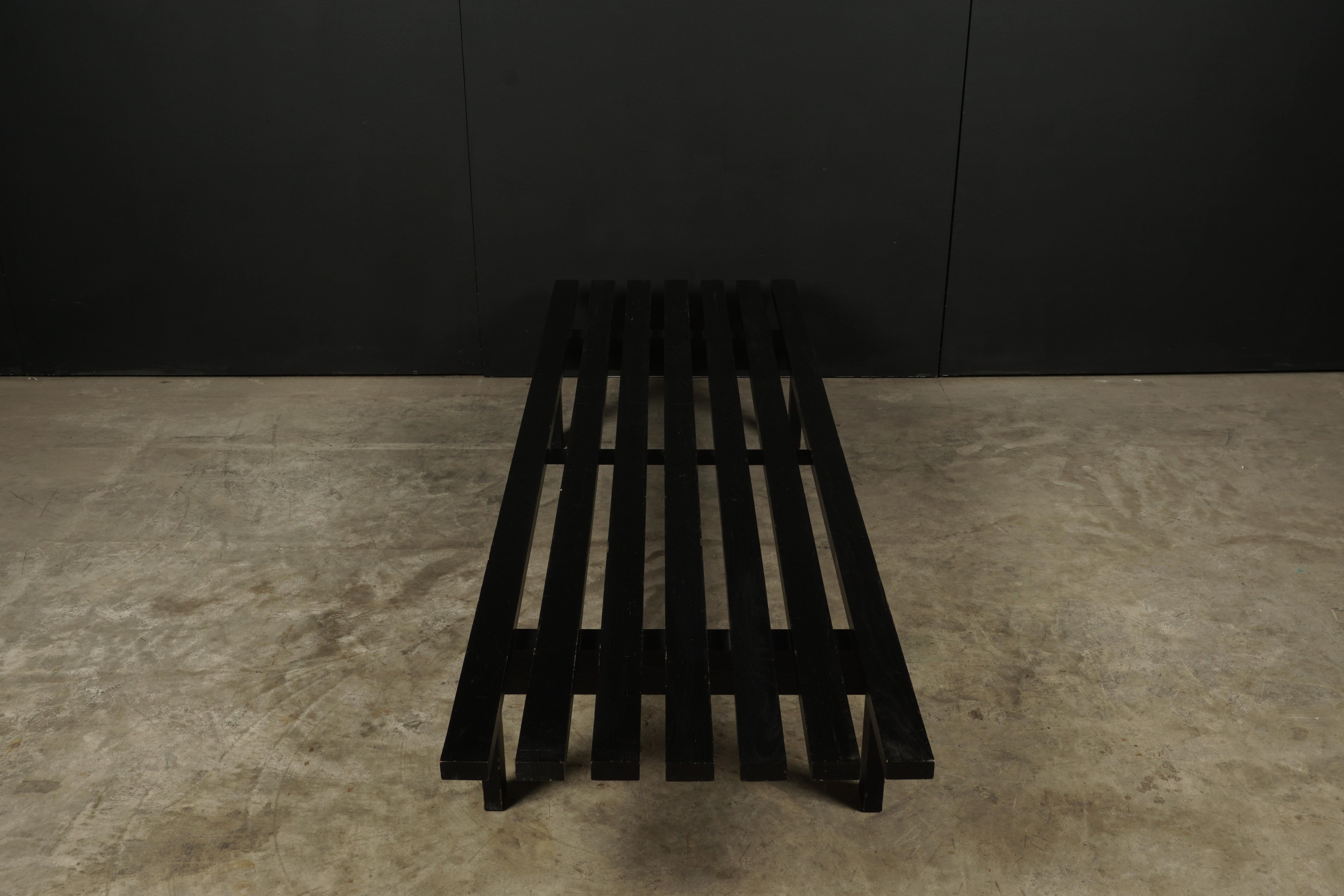 Midcentury bench designed by Martin Visser for Spectrum, circa 1950. Black lacquered wood planks and solid construction.