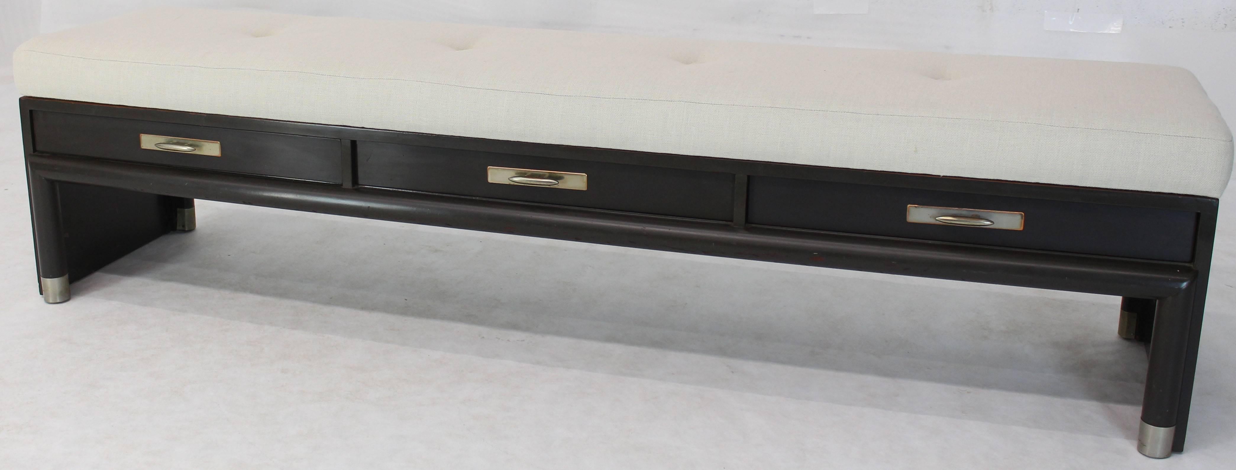 Ebonized finish base with three drawers upholstered bench or narrow daybed.
