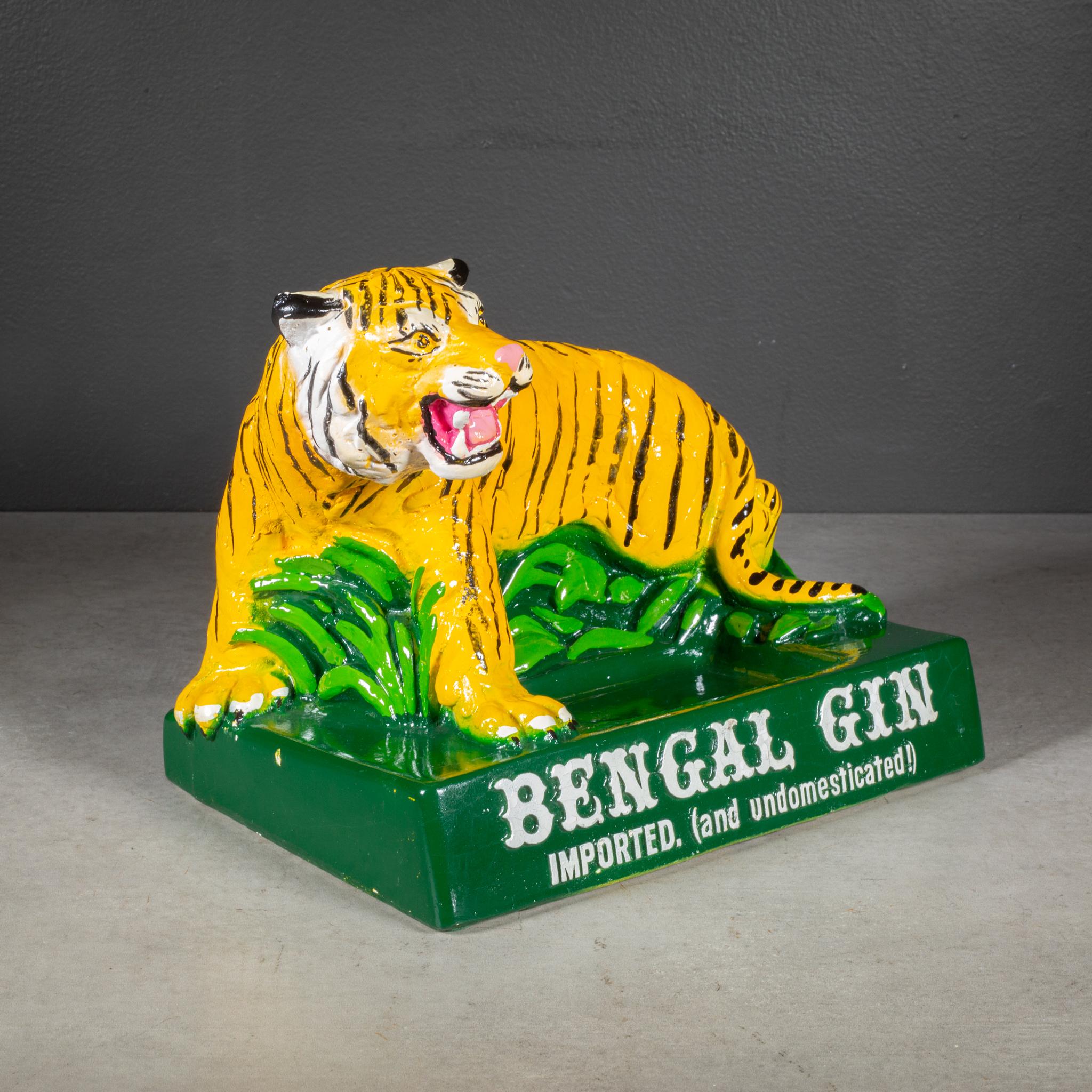 CIRCA

 Un espositore pubblicitario in gesso Tiger della metà del secolo scorso veniva utilizzato per contenere una bottiglia di Bengal Gin in un bar o in un ristorante. 

    CREATORE Bengal Gin, Londra, K.K.
    DATA DI FABBRICAZIONE 1950-1960.
  