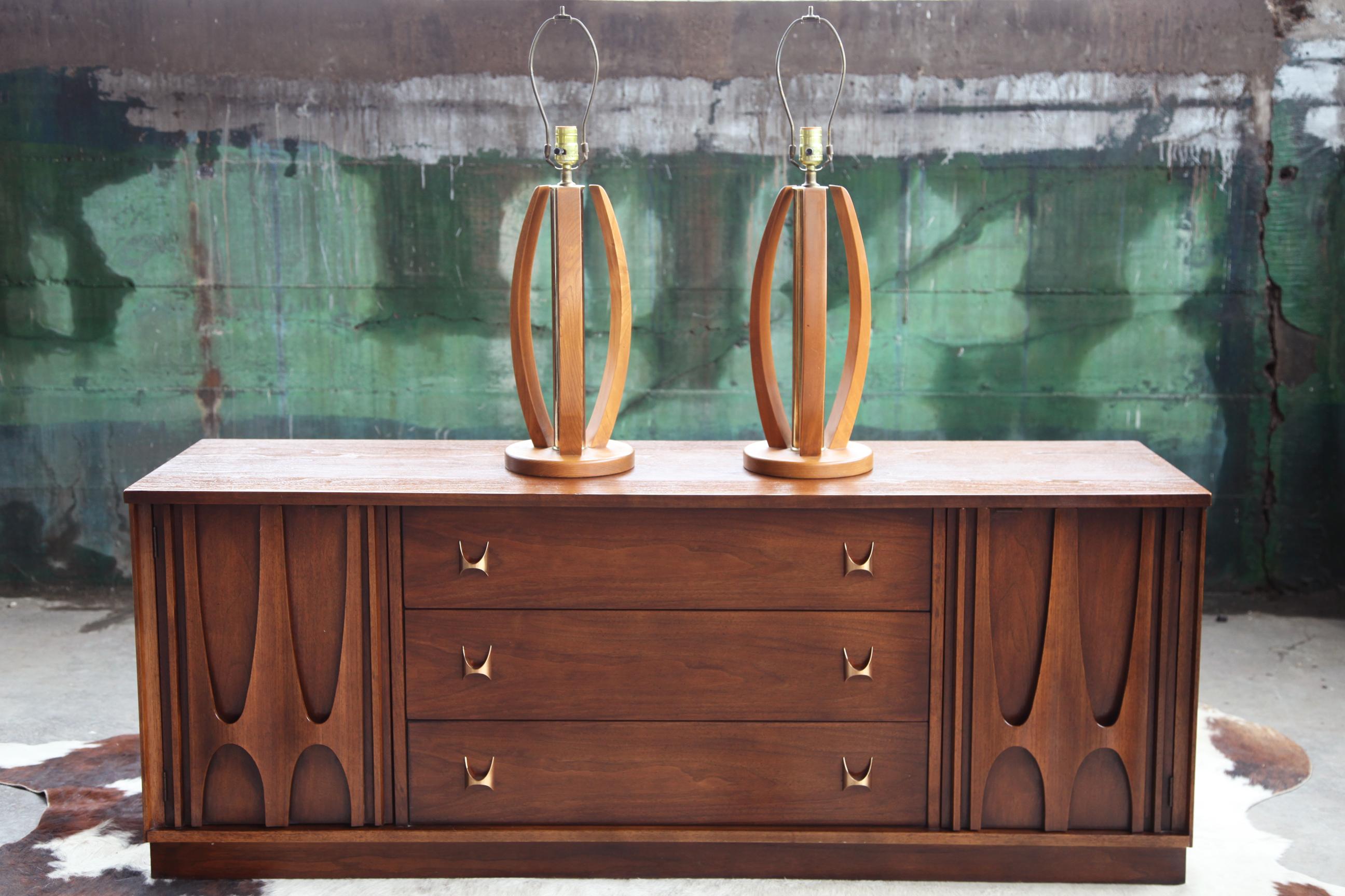 Materials

Wood, Brass

These original vintage bentwood lamps make a wonderful pair for any avid mid century collector. They are beautifully made sculptural lamps.

Condition:
Great condition throughout both lamps. These lamps pair well with teak