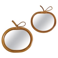 Paire de miroirs en forme de pomme en bois courbé et en rotin, France, 1960