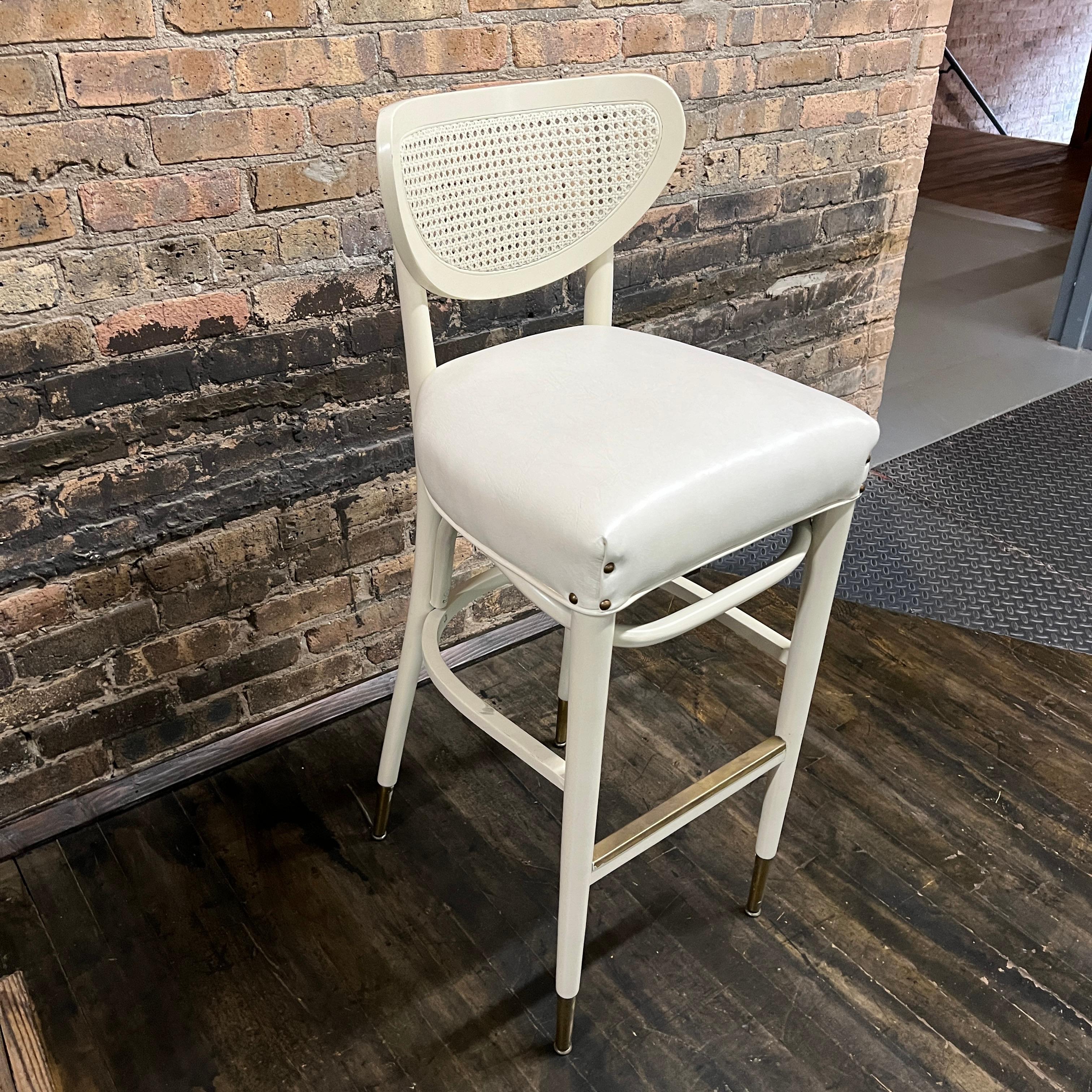 These mid-century barstools belonged to a wealthy family that entertained often.  They were placed at the enormous bar at the lower level of their time capsule home. They were refinished and reupholstered at some point. The wood was lacquered