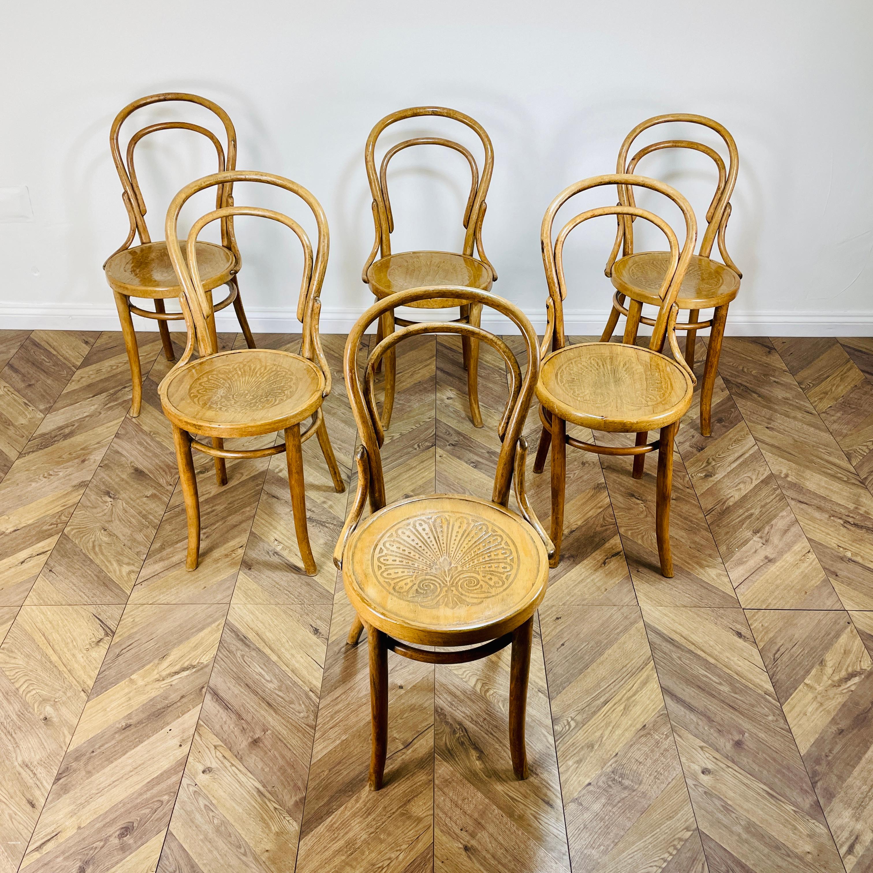 A Set of 6, midcentury Bentwood Cafe / Bistro Chairs, Set of 6, circa 1930s.

Made in Poland by CLC in the Thonet style, the chairs are in great condition, and boast a lovely warm patina.

The chairs do have minor scuffs and marks to the