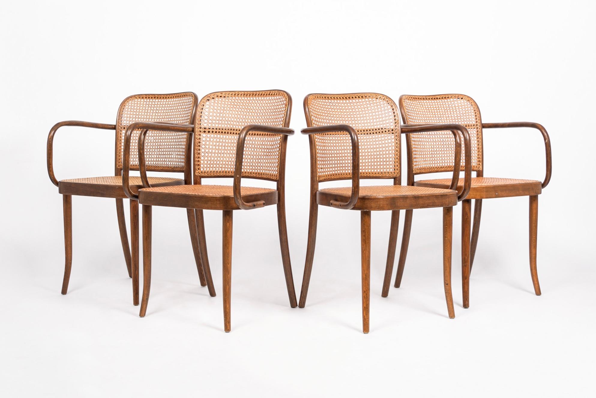 This set of four vintage mid century Bentwood Prague Model 811 cafe dining chair were originally designed by Austrian architects Josef Hoffman & Josef Frank for Thonet in the 1920s. These chairs were made in Czechoslovakia by Stendig circa 1960. The