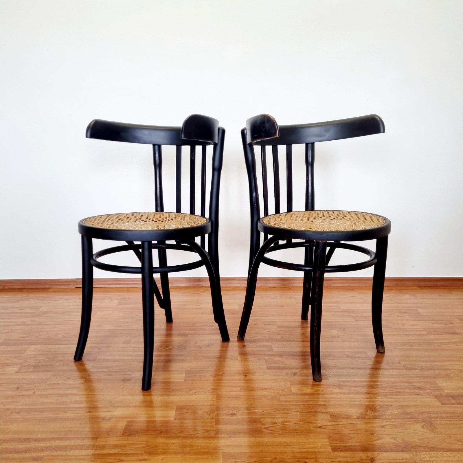 Pair of Mid Century bentwood and cane chairs from the 50s era.
In good vintage condition with signs of use and age. All visible on pictures. The cane net is in original condition; hand-woven.