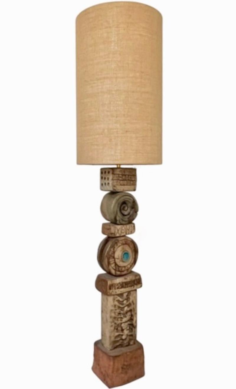 A heavy ceramic TOTEM lamp by Bernard Rooke, England. Mid-20th century, England. For notes on shade and wiring see below.

The totem is a sculptural statement piece - floor or table size - made up of ceramic elements in natural tones of terracotta