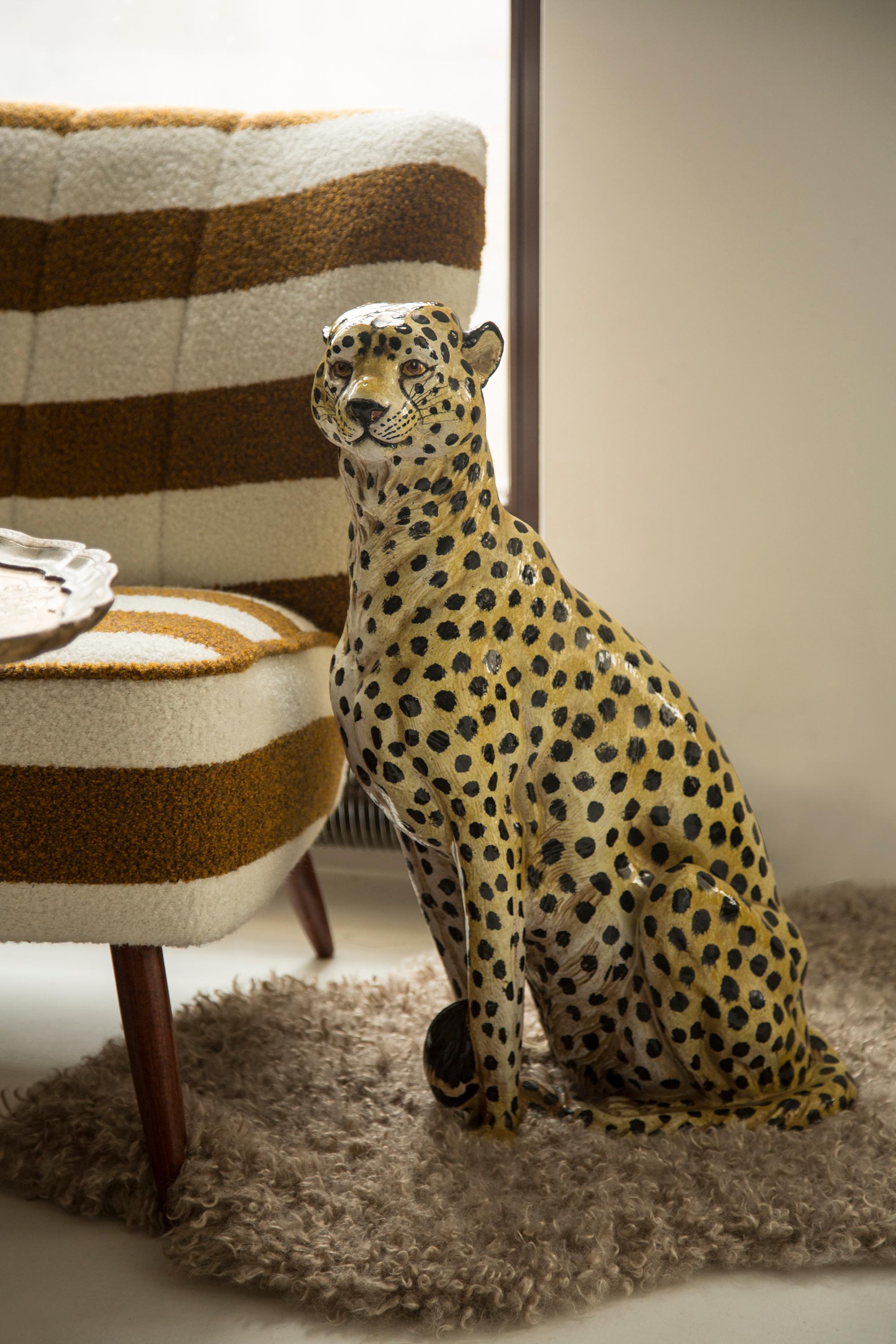 large ceramic cheetah statue