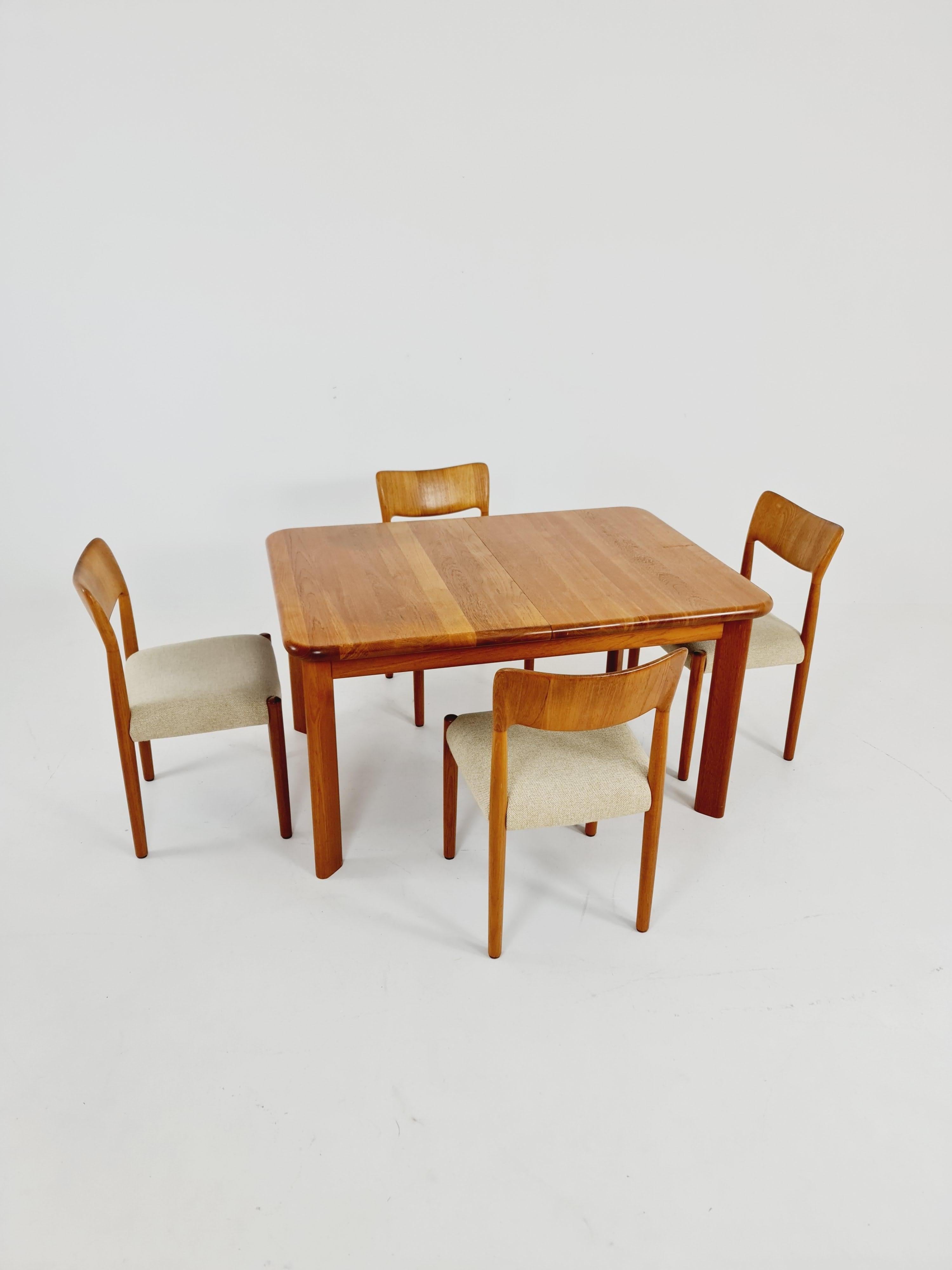 MId Century Big solid teak Dining Table By  Glostrup, 1960s

The table is ingood condition. 

Made of Solid teak wood   

Made in Denmark by Golsturp Møbelfabrik DK 7700 

The table can be enlarged very easily by means of the two integrated plates