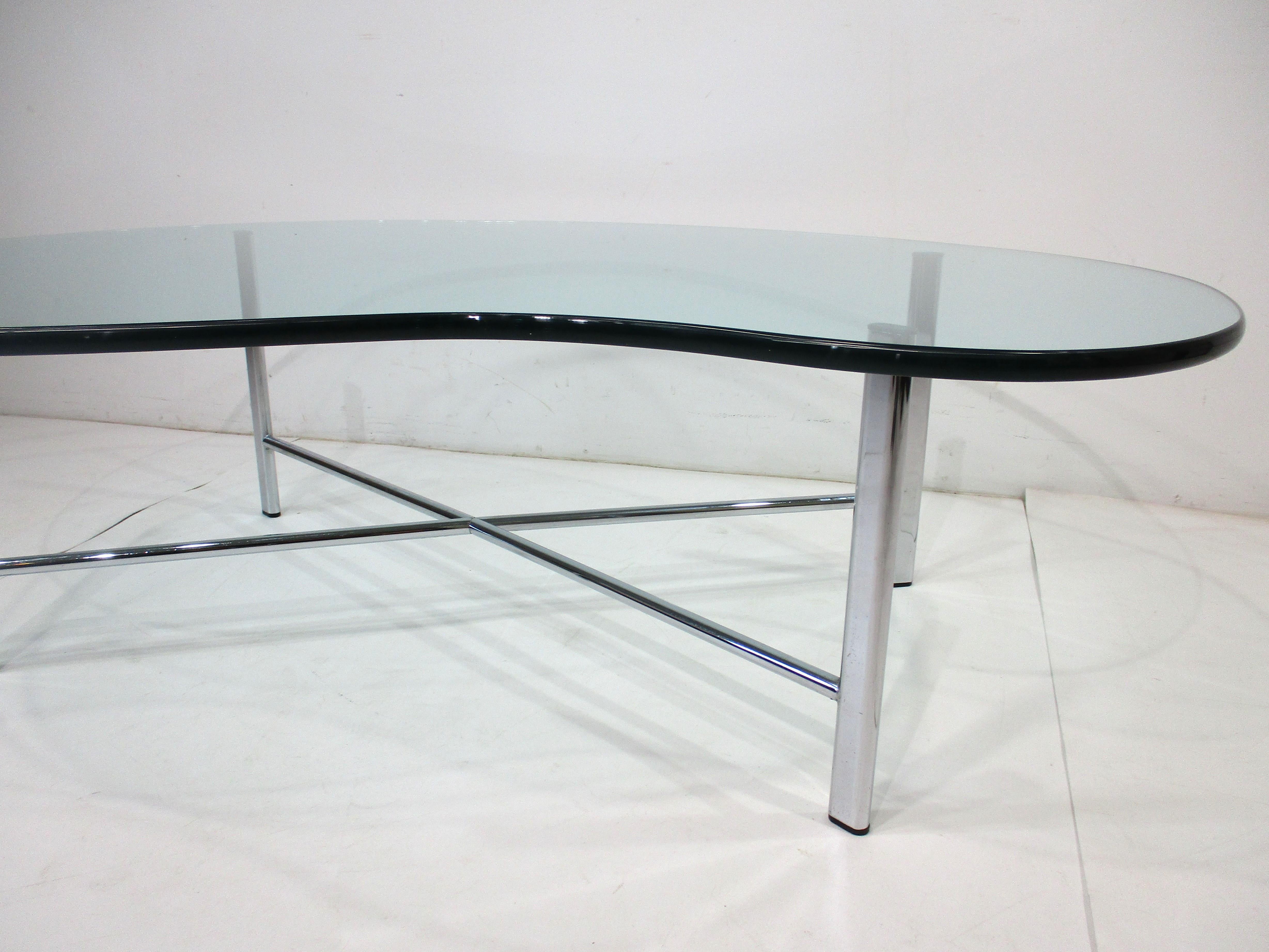 20th Century Mid Century Biomorphic Glass / Chrome Coffee Table in the style of Colombo