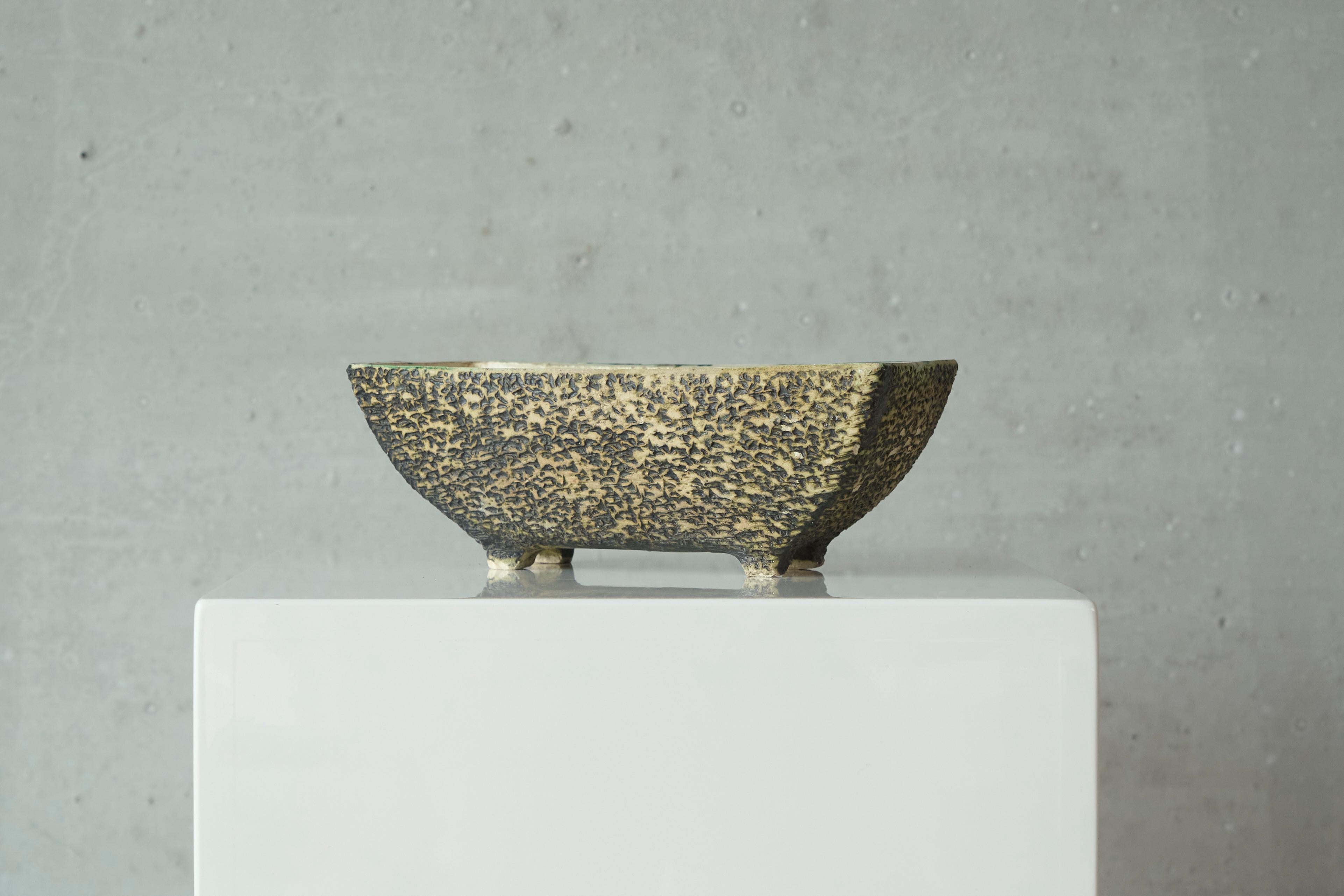 Mid Century Birch Bark Studio Pottery Planter, Europe, 1950s.

A wonderful and quintessential mid century planter in a very distinct 'birch bark' finish. European - presumable Dutch - but with an almost Japanese pottery quality over it. 

Beautiful