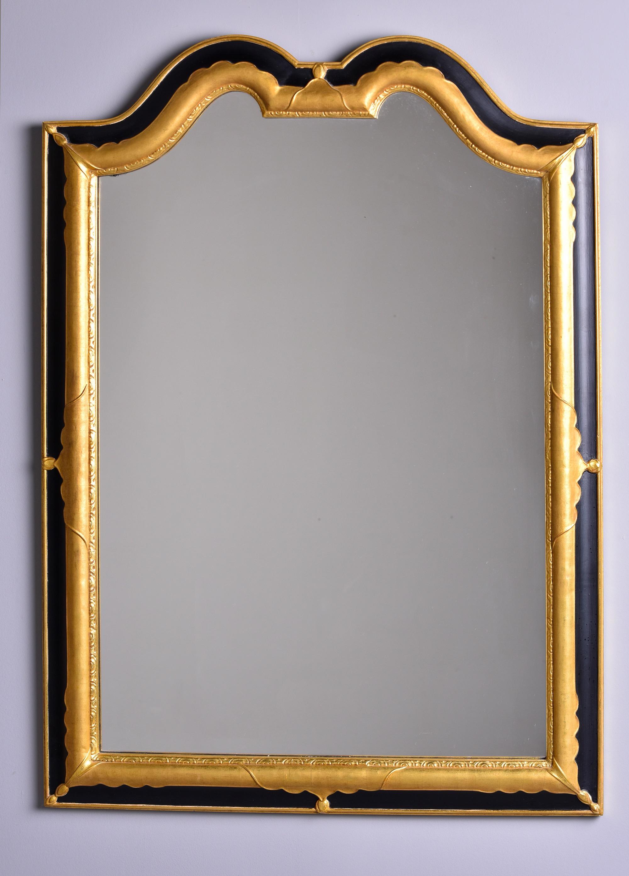 Schwarzer und vergoldeter Rahmenspiegel aus der Mitte des Jahrhunderts  (Hollywood Regency) im Angebot