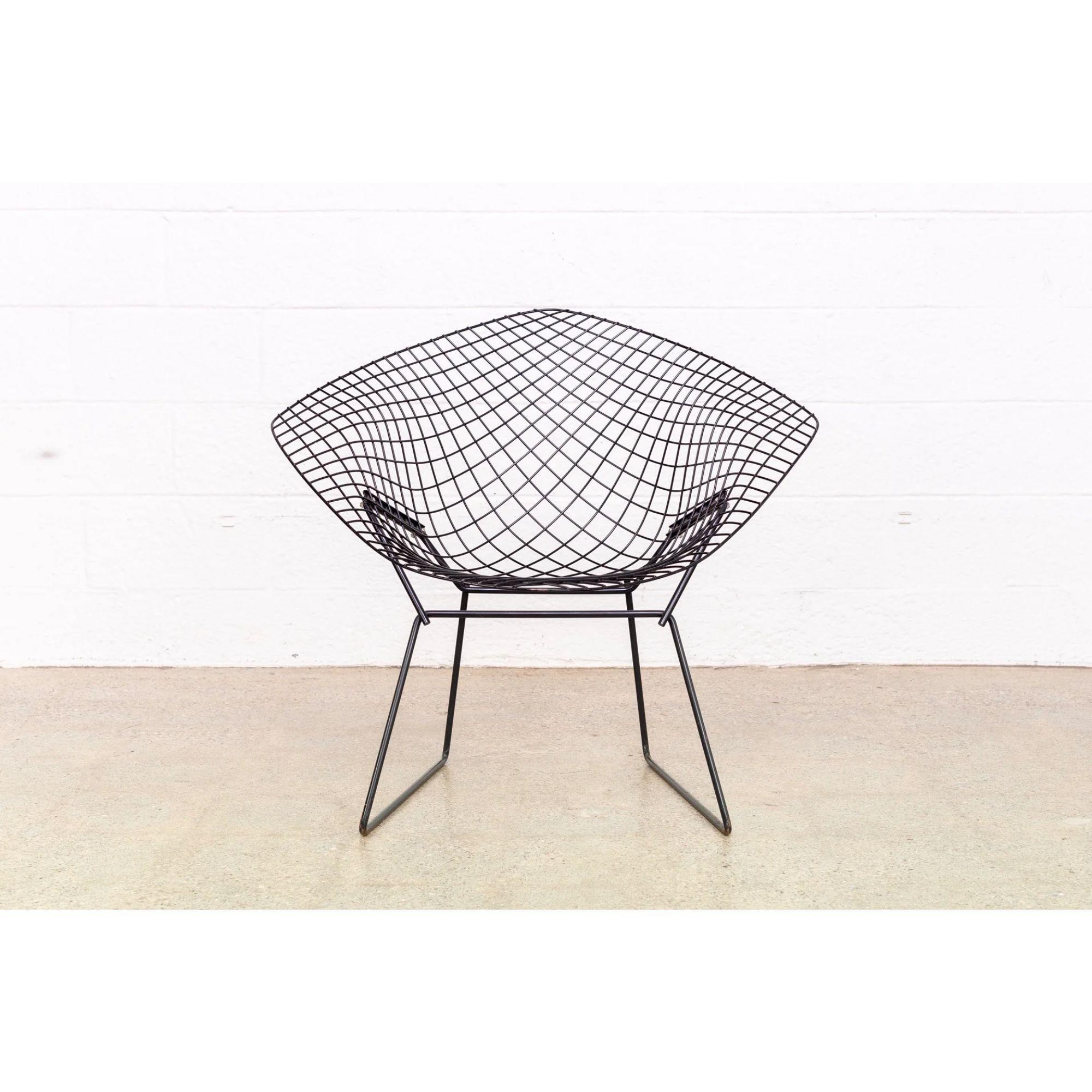 Original Vintage Mid Century Harry Bertoia for Knoll Black Diamond Wire Lounge Chair

This vintage diamond wire lounge chair was designed by Harry Bertoia for Knoll in 1952. The chair features welded steel rod construction with a black finish. The