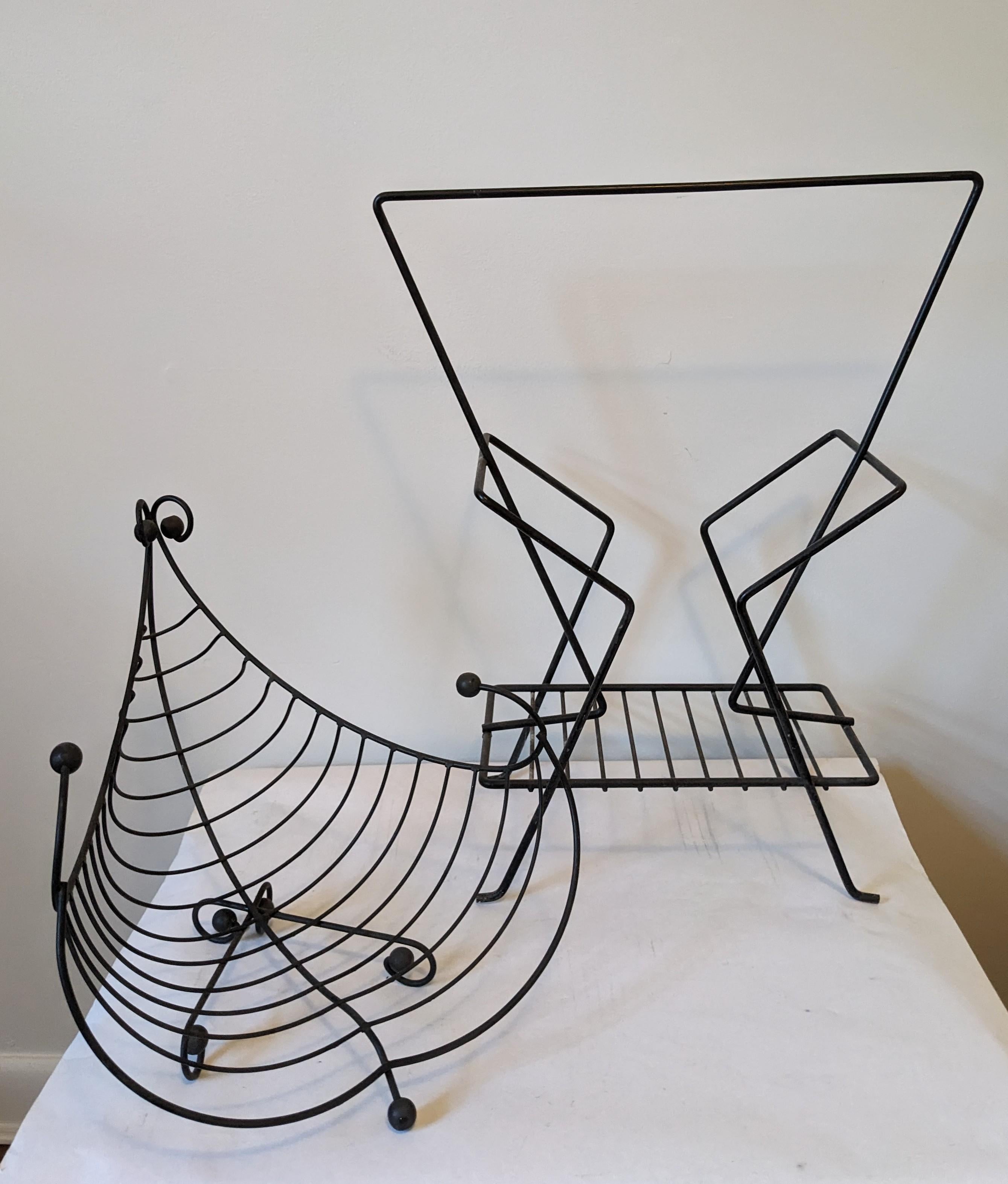 Mid Century Wire Work Accessory Ensemble from the 1960's in black enamel. Set of 4 pieces including small bookshelf, cornucopia, hoop paper or log holder and upright magazine stand. The round hoop holder is brass toned, not black enamel like the
