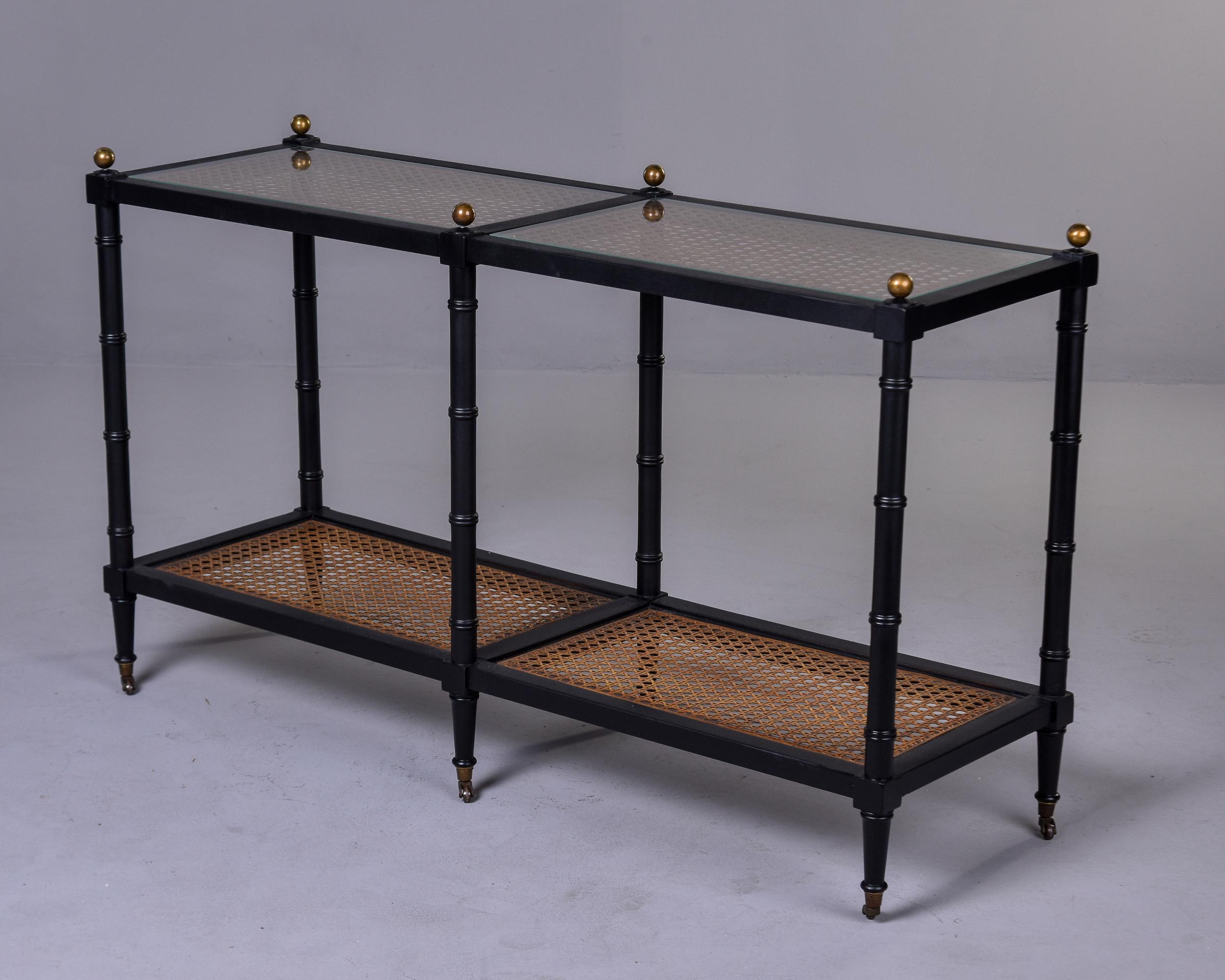 Unknown Mid-Century, Black Faux Bamboo and Caning Two Tier Console on Casters 