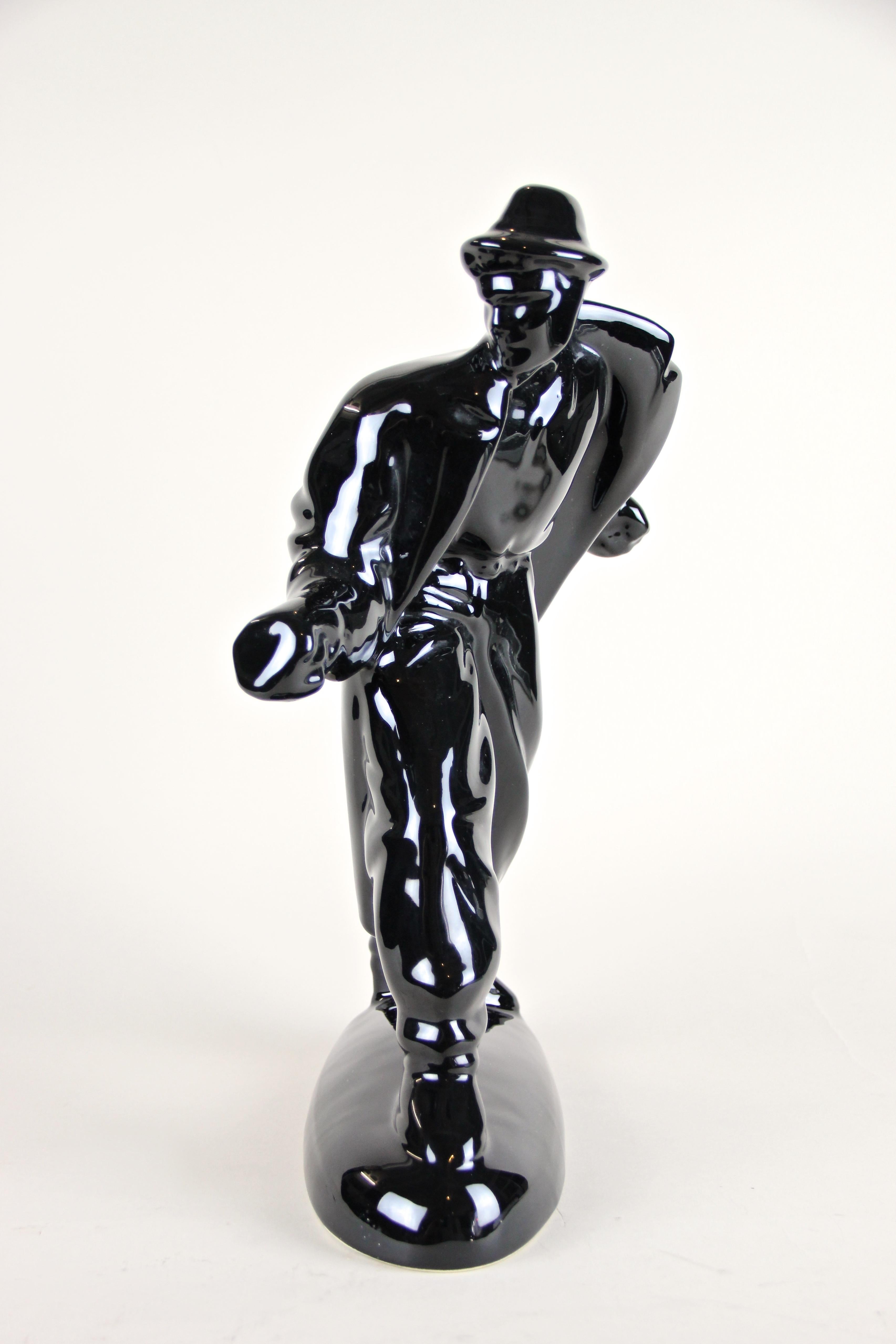 Very decorative midcentury black figural sculpture 