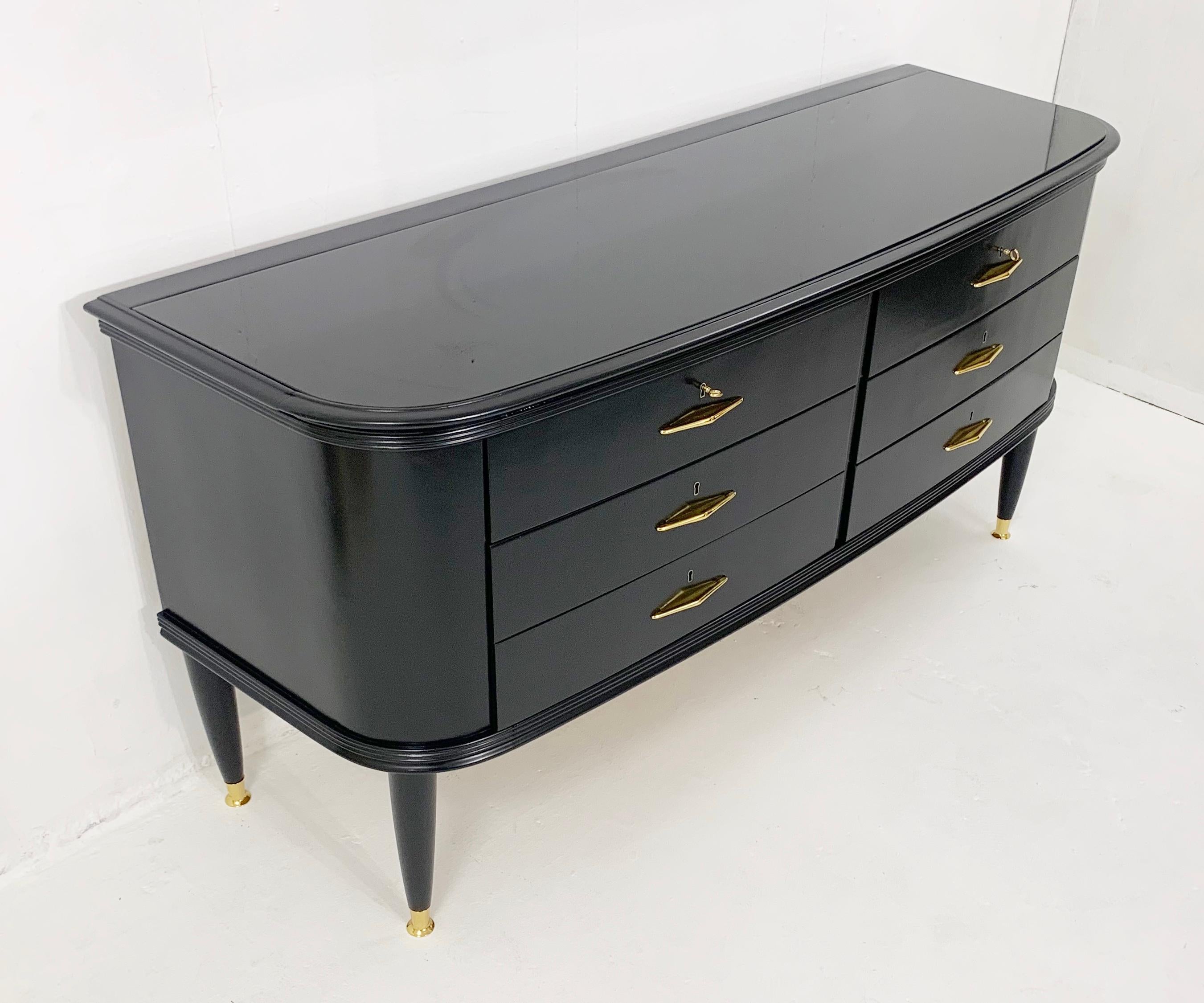 Mid-century black lacquered chest of drawers with glass top - Italy 1950s.
