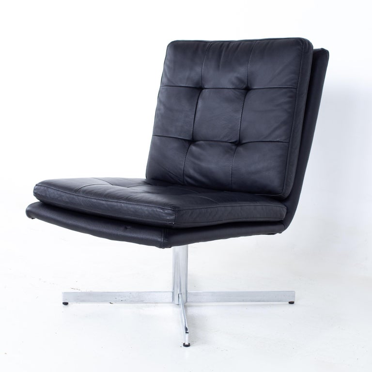 Mid century black leather and chrome slipper lounge chair
Chair measures: 22.5 wide x 30 deep x 32.5 high, with a seat height of 17 inches

All pieces of furniture can be had in what we call restored vintage condition. That means the piece is