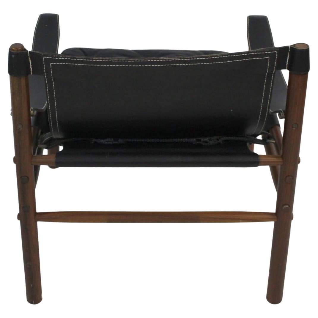 Sillón Sirocco Safari de cuero negro de mediados de siglo Arne Norell Sueco en venta
