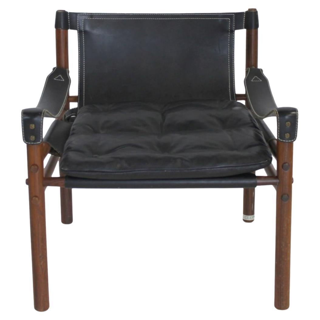 Sillón Sirocco Safari de cuero negro de mediados de siglo Arne Norell en venta