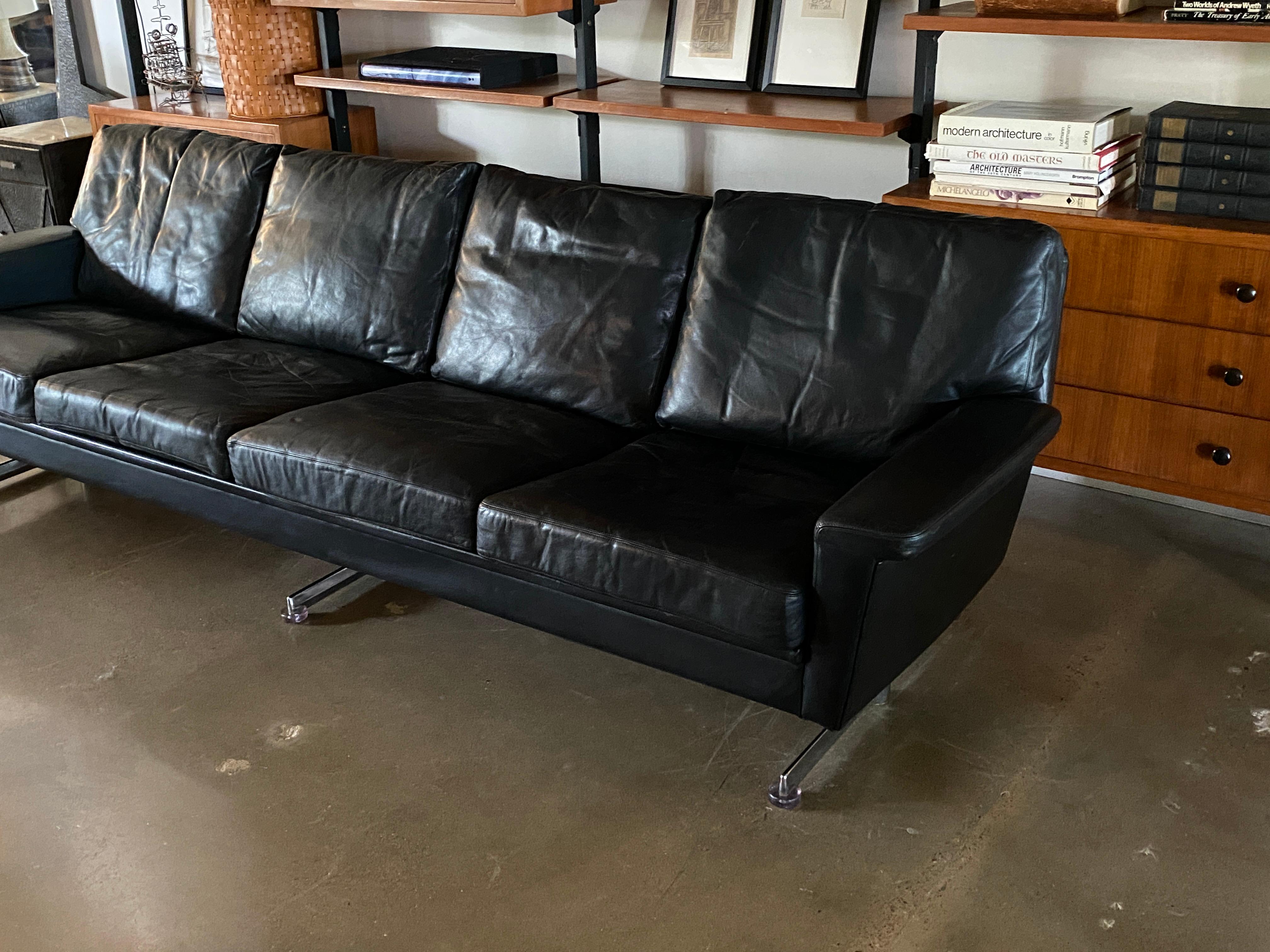 black leather sofa chrome legs