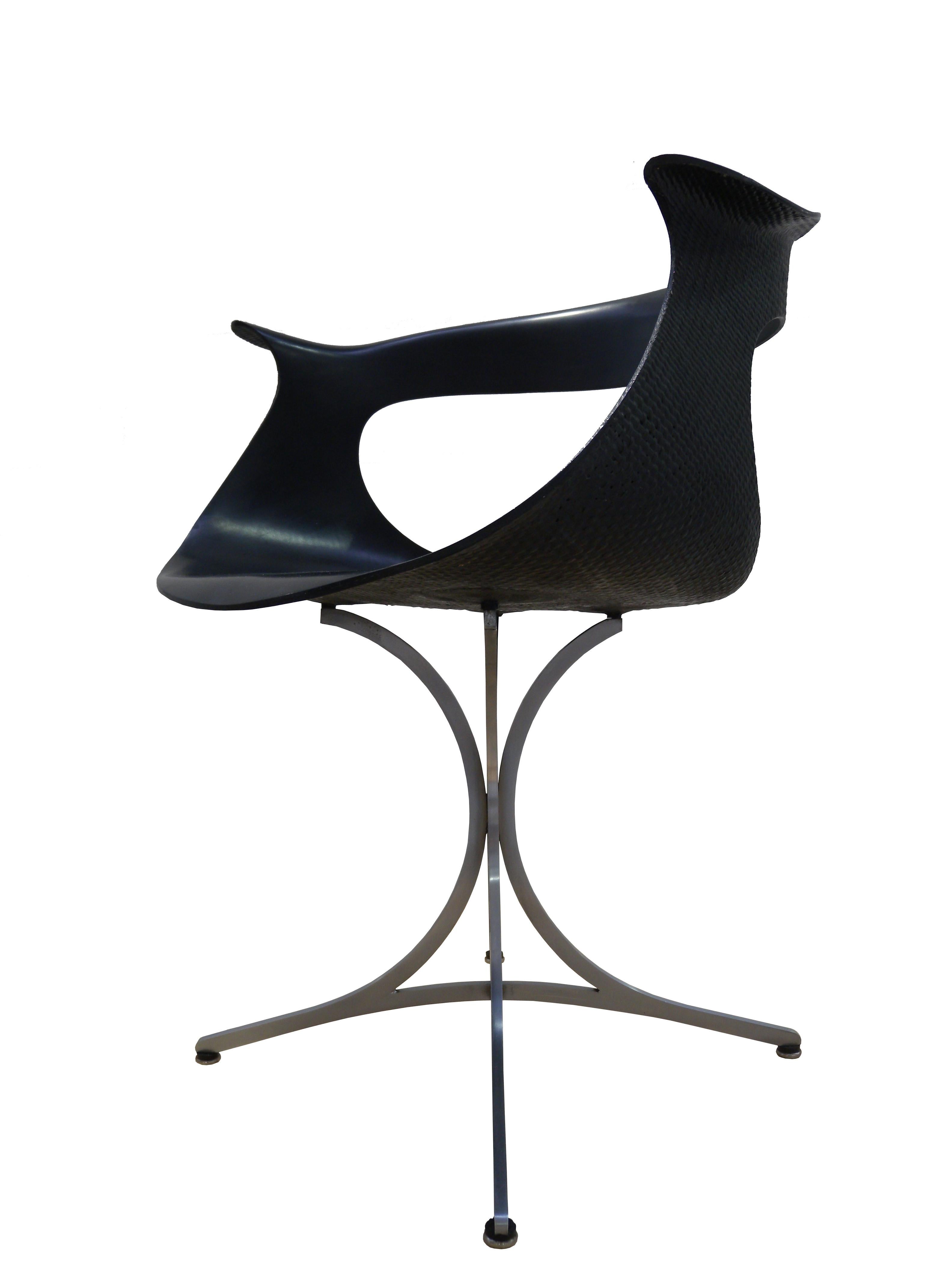 The Lotus armchair designed and developed by Erwine and Estelle Laverne is a great example of futurist design and the forward thinking of Modernism.