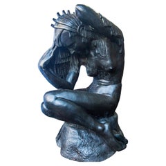 Mid Century Black Marble Figure of a Sitting Nude Woman