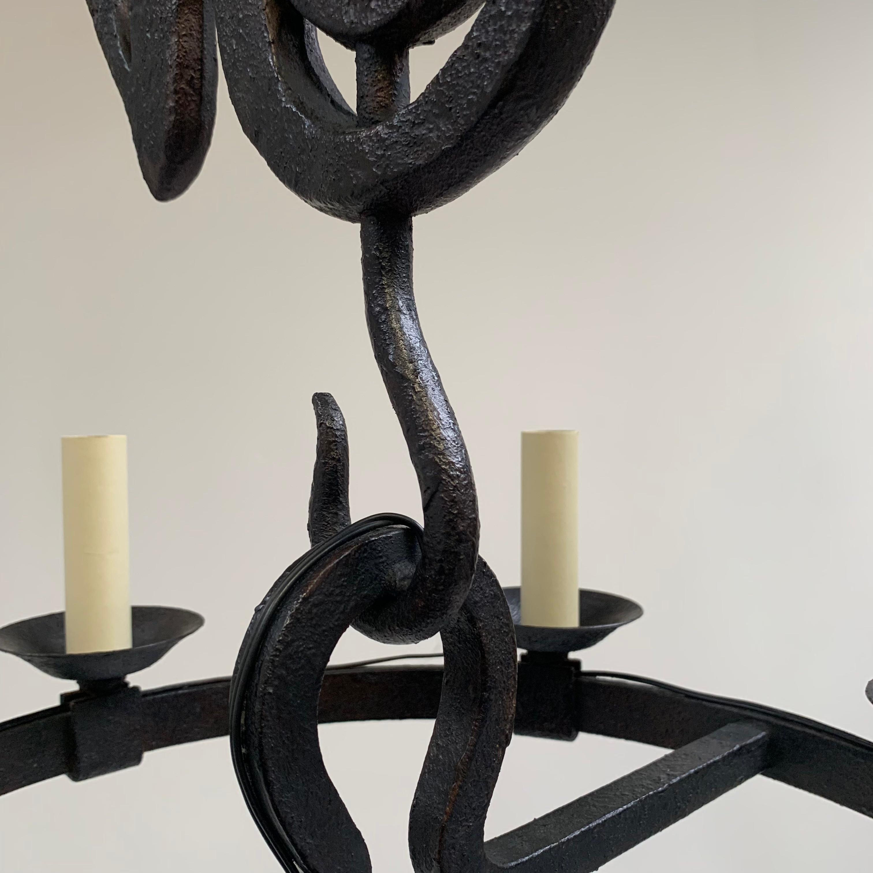 Mid-Century Black Wrought Iron Girouette Chandelier, France circa 1950. For Sale 1